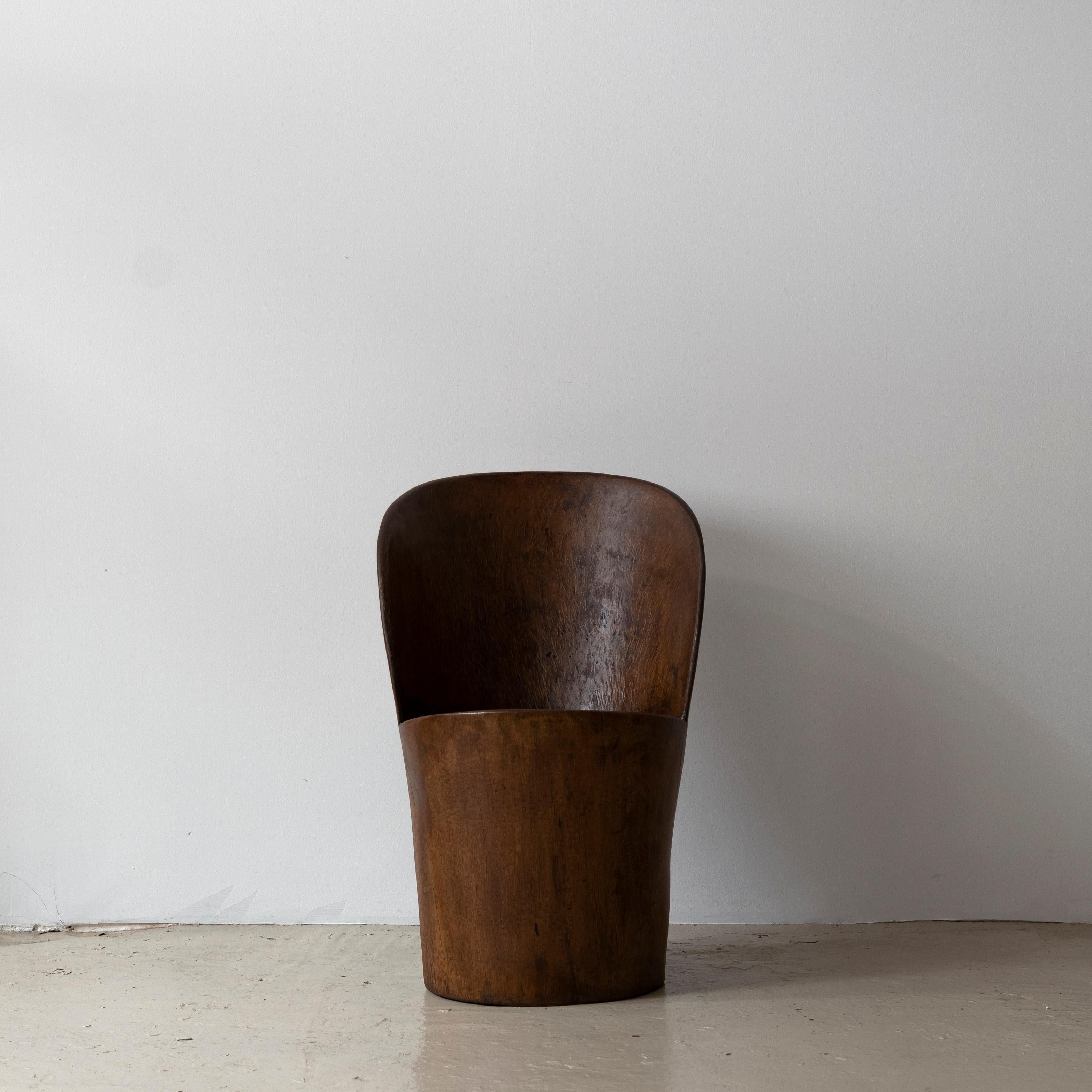 Hand-sculpted chair by José Zanine Caldas, Circa 1970s.

This chair was made of Brazilian hard wood. Signed 