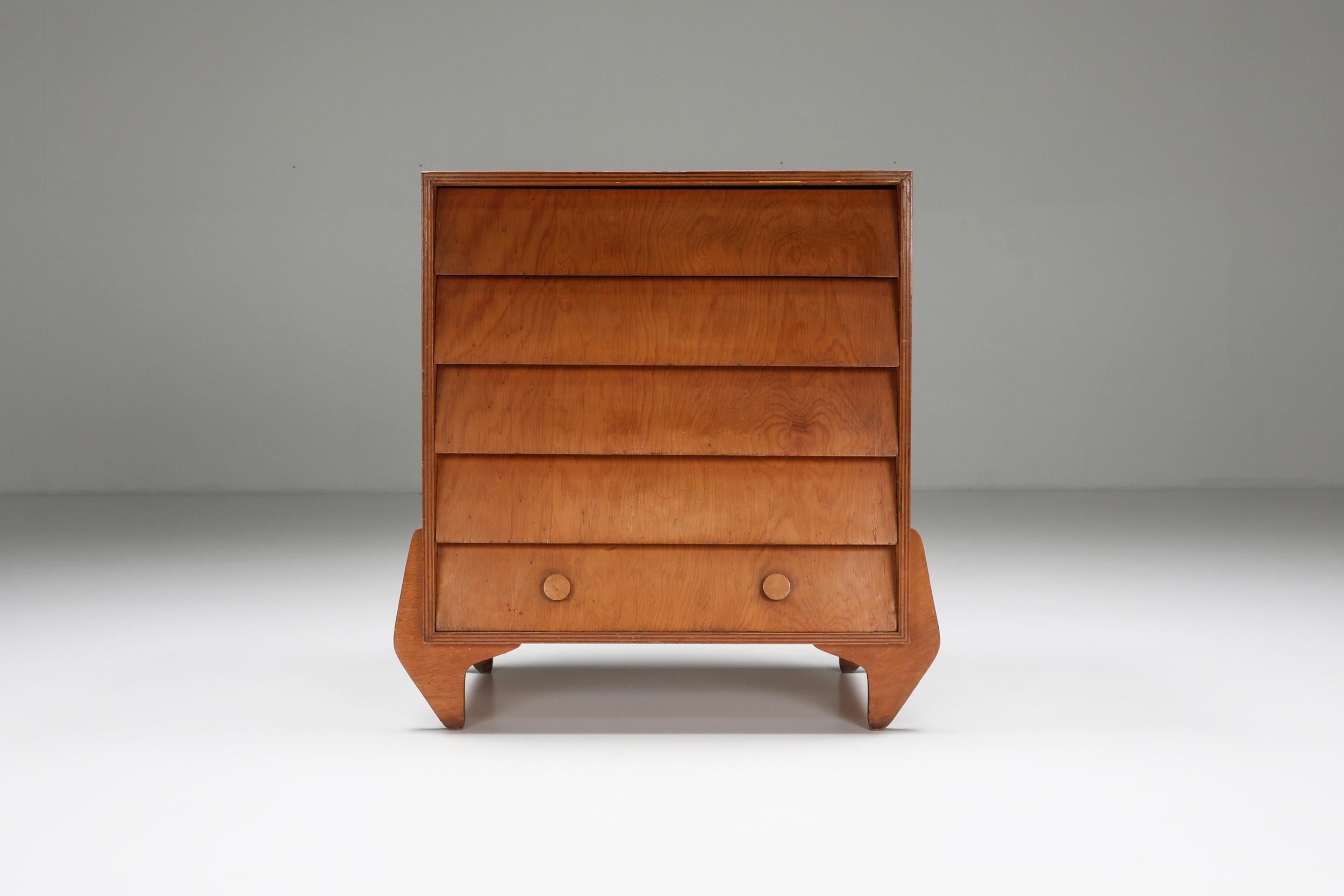 Jose Zanine Caldas; Commode; Mid Century Modern; Brazilian Design; 1970s;

A sought-after piece in very good condition. This wooden commode with its geometric shapes features a sculptural look.

A self-taught artist, designer, and architect, Jose