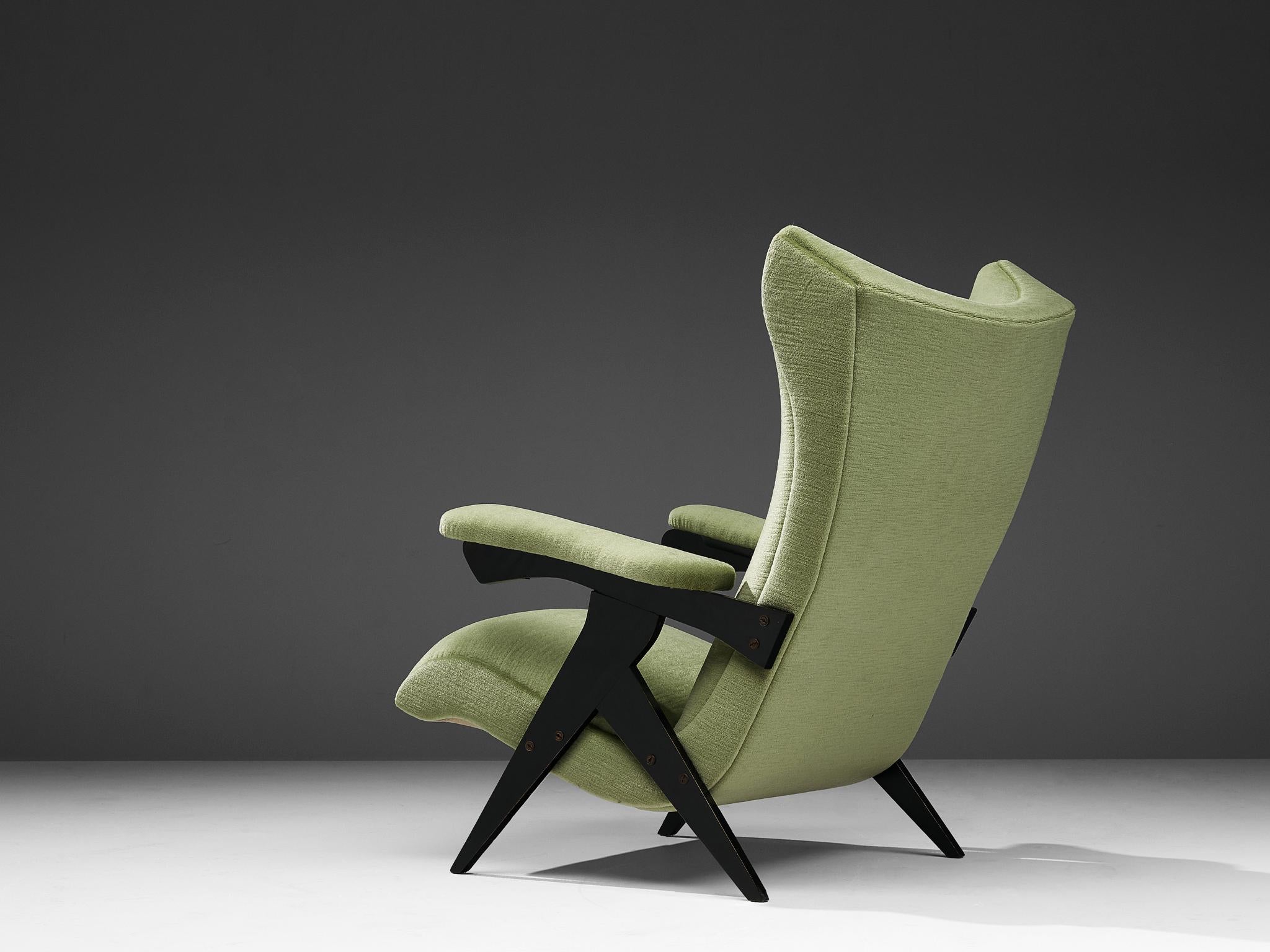 José Zanine Caldas for Móveis Artísticos Z factory, high back lounge chair, reupholstered in green mohair, lacquered wood, Brazil, circa 1950 

This armchair is designed by the esteemed Brazilian designer José Zanine Caldas for Móveis Artísticos Z