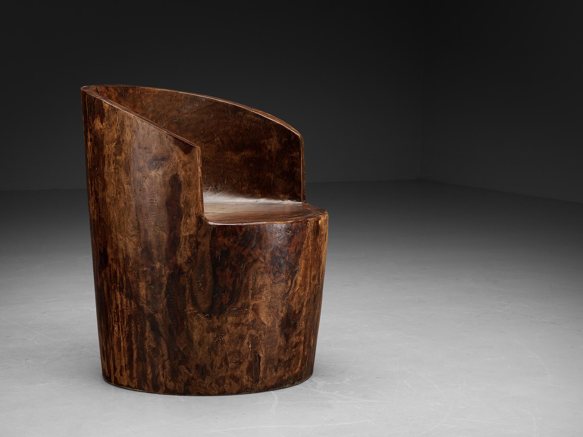 José Zanine Caldas, hand-sculpted chair, model ‘Pilão’, Brazilian hardwood, Brazil, 1975

This exquisite hand-carved chair exemplifies the core principles embodied by José Zanine Caldas: a profound love for nature, particularly wood. Crafted with