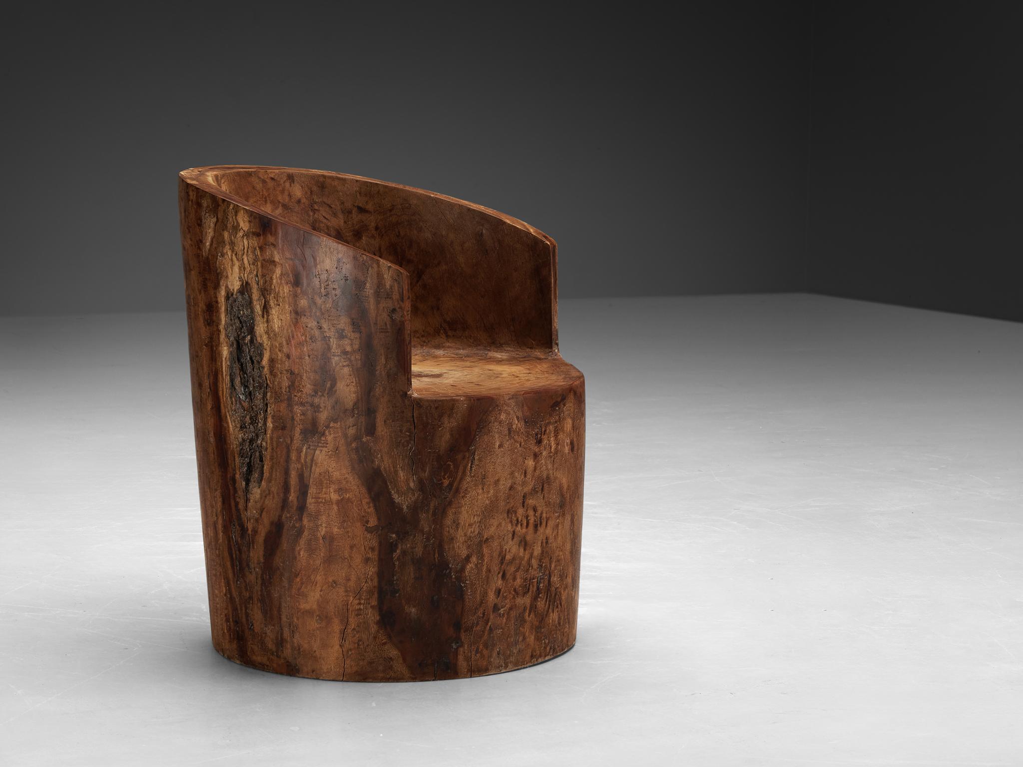 José Zanine Caldas, hand-sculpted chair, model ‘Pilão’, Brazilian hardwood, Brazil, 1975

This exquisite hand-carved chair exemplifies the core principles embodied by José Zanine Caldas: a profound love for nature, particularly wood. Crafted with