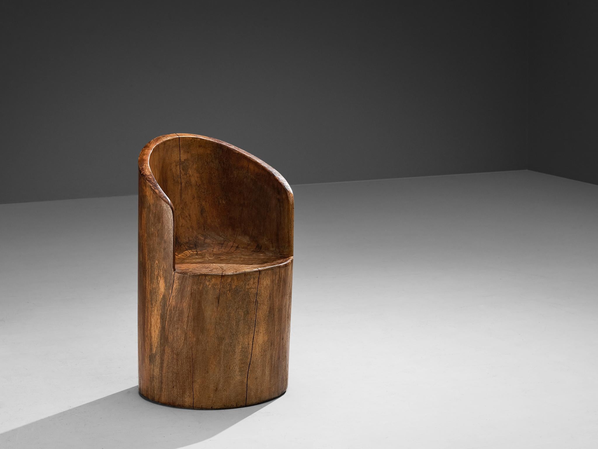 José Zanine Caldas, hand-sculpted chair, Brazilian hardwood (Vinhático), Brazil, 1980s

This exceptional hand carved chair embodies everything that José Zanine Caldas stood for: love of nature and especially wood. Created in the 1980s, this chair is