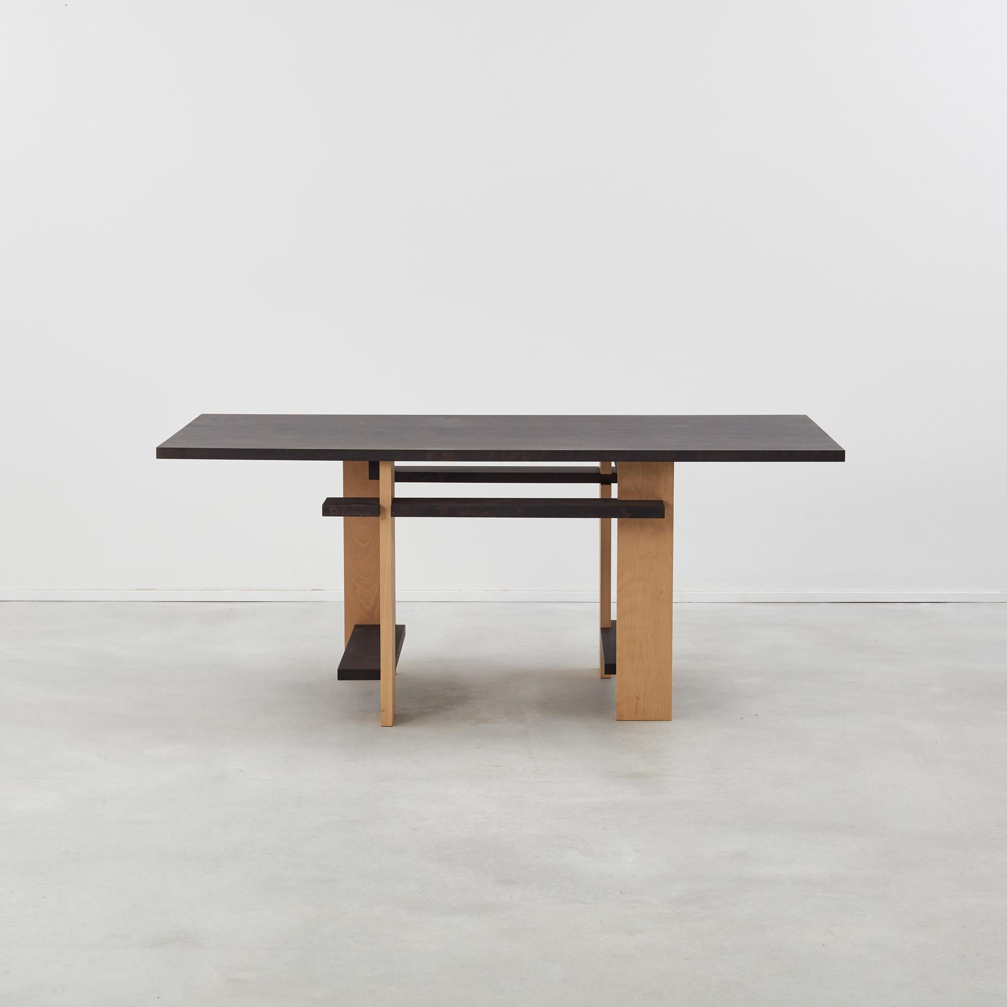 Designed during his tenure at the Bauhaus, Josef Albers’ Conference table exemplifies the school’s radical synthesis of craftsmanship and modernist form. Constructed from alternating bands of light and dark oak, the piece embodies his early