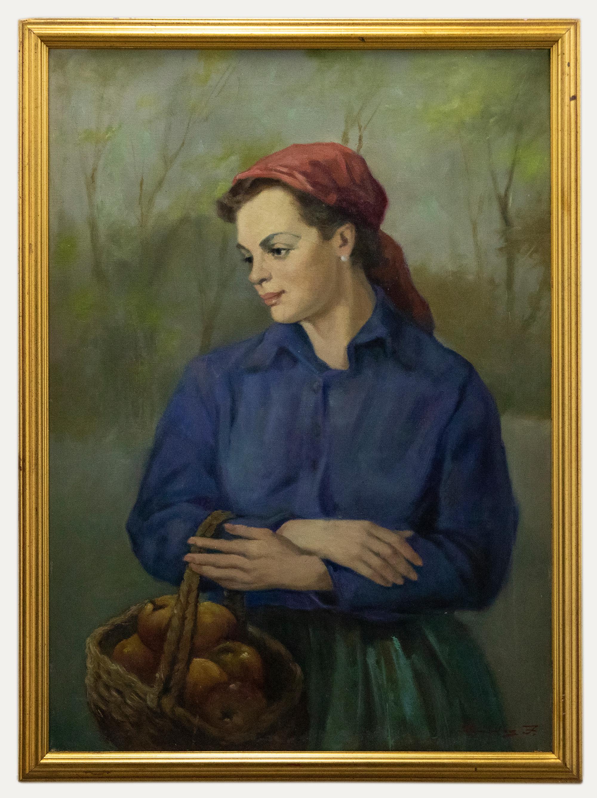 A fine female portrait by Hungarian artist Josef Bodis. The women is seen wearing a bright blue blouse with a red headscarf and green pleated skirt, carrying a basket of orchard apples. Bodis has signed the composition to the lower right and the
