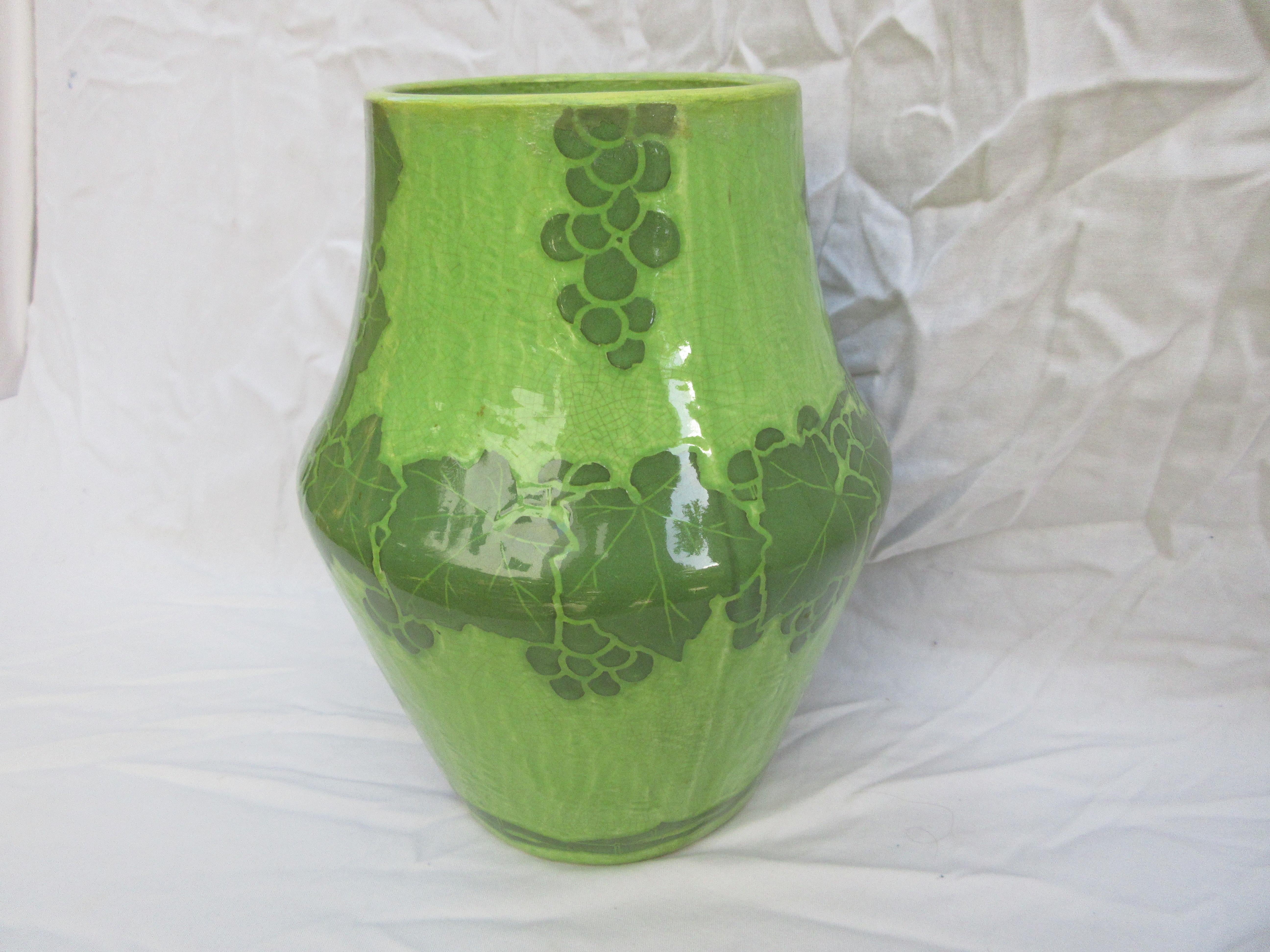 This is a handmade vase, this is a rare 2-tone green vase. The only one of its kind. Signed and dated, J-Ekberg 1907. A Swedish Artist that started working for the Gustavsberg Ceramic Foundry in Stockholm Sweden in 1898 and worked there till his