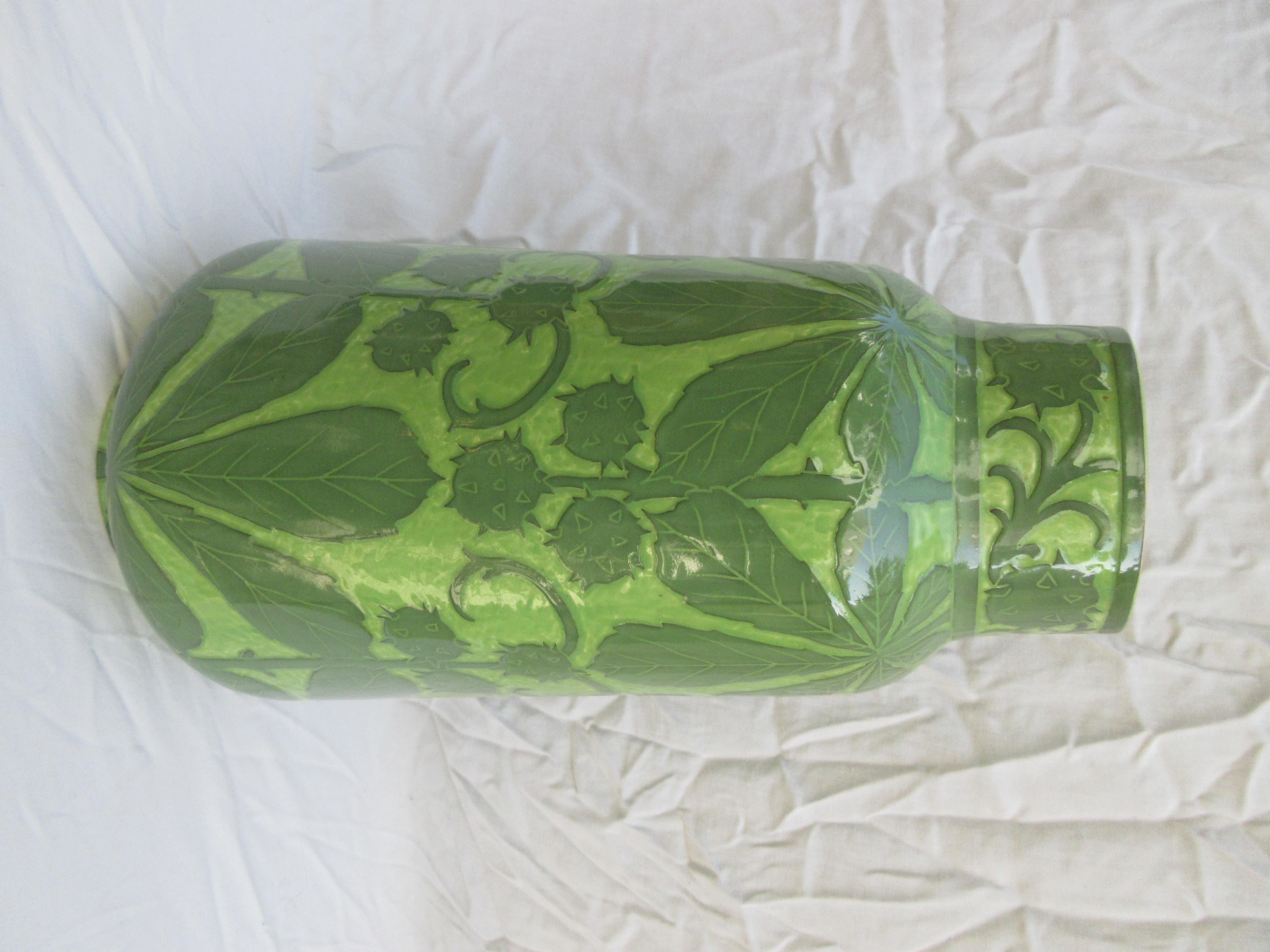 This is a handmade vase, this is a very rare 2 tone green. The only one of its kind. Signed and dated, J-Ekberg 1908. A Swedish Artist that started working for the Gustavsberg Ceramic Foundry in Stockholm Sweden in 1898 and worked there till his