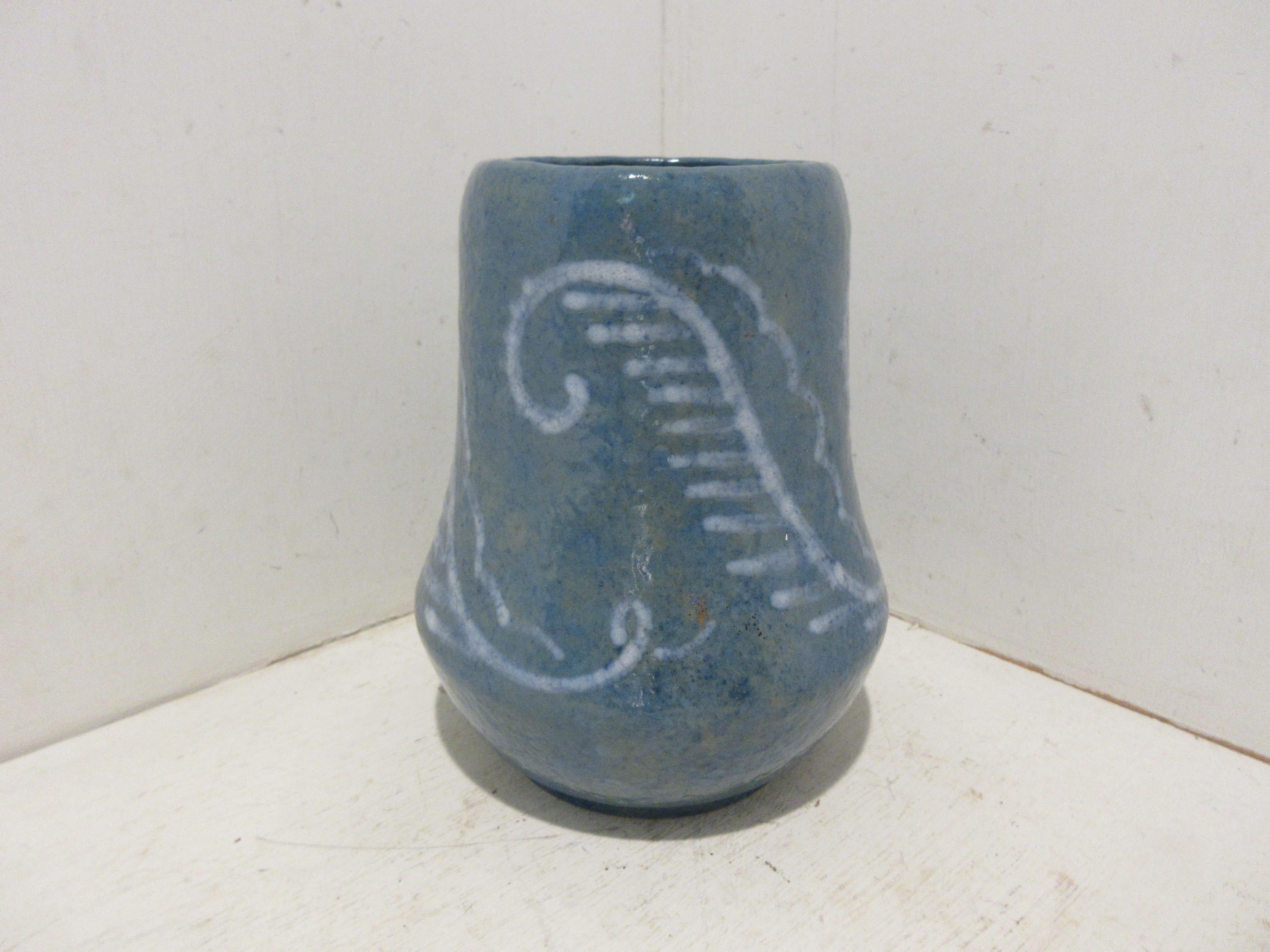 This is a handmade, 1 off Sgraffito vase made by the Swedish ceramic artist Josef Ekberg in 1907. He was one of Sweden’s top ceramic artist at the time. He started working at the Gustavsberg foundry in 1898 till his death in 1945. His works are