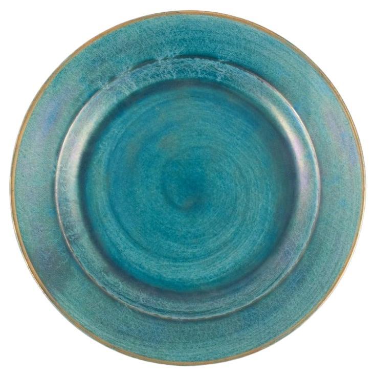 Josef Ekberg for Gustavsberg. Large round ceramic dish with green-toned glaze For Sale