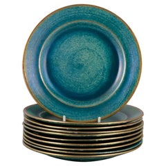 Josef Ekberg for Gustavsberg, Sweden. Set of ten ceramic plates.