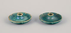 Josef Ekberg for Gustavsberg, Sweden. Three candle holders, mid-20th C.