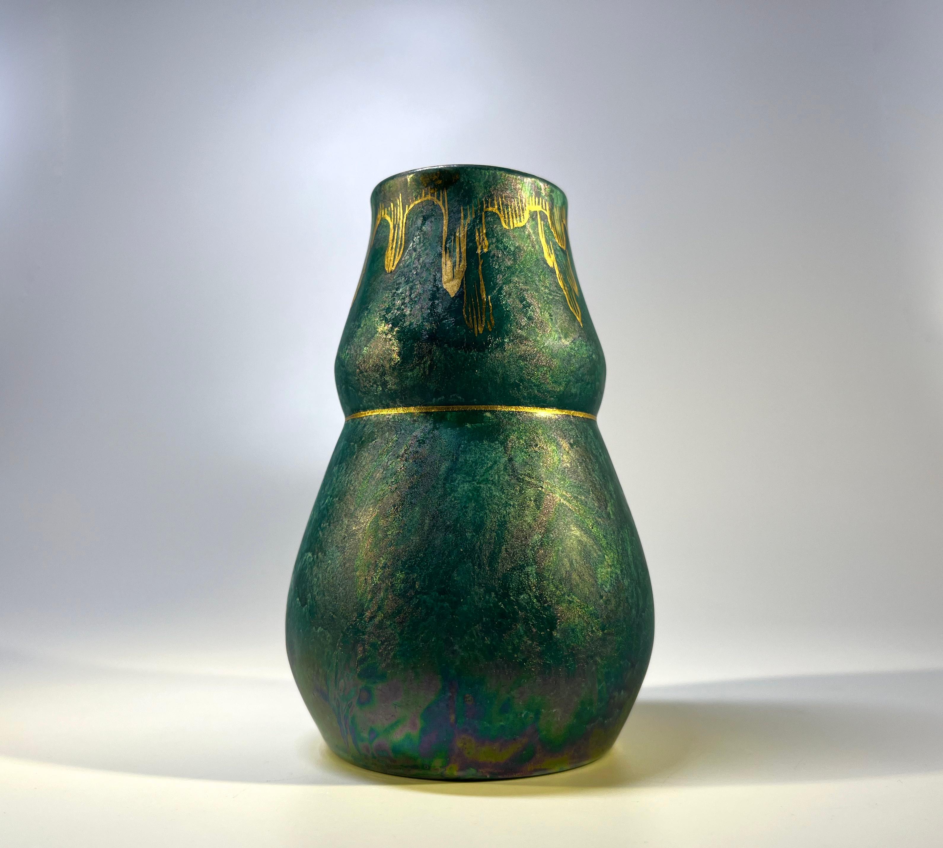 A super little vase glazed with an intriguing sea green lustre and hand decorated with gilt decoration by Josef Ekberg for Gustavsberg, Sweden
Wonderful Ekberg craftsmanship
Signed and Anchor mark to base
Height 4.75 inch, Diameter 3.25 inch
In