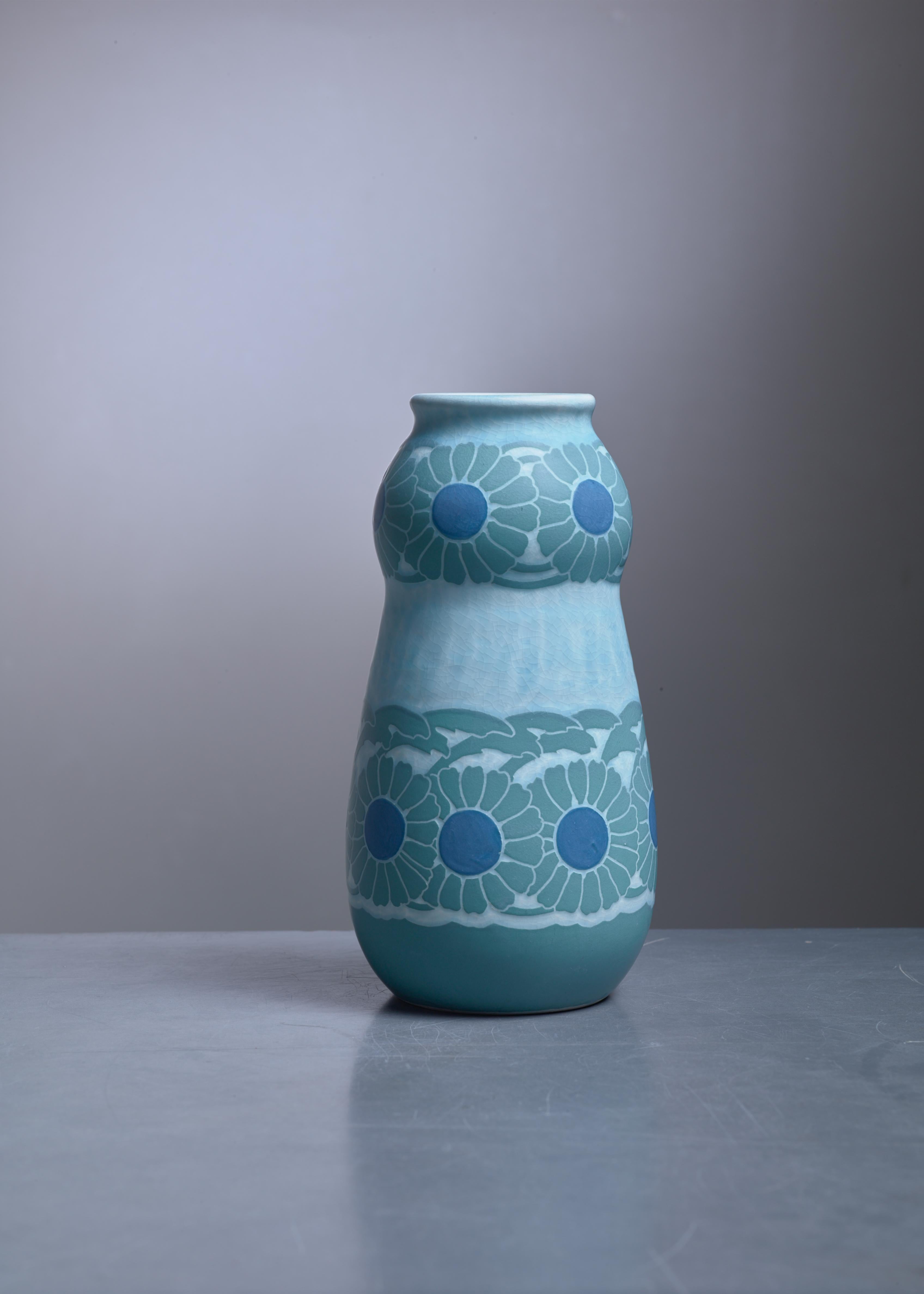 A polychrome sgraffito ceramic vase by Josef Ekberg for Gustavsberg.
Signed by Ekberg with the year of production (1910).

