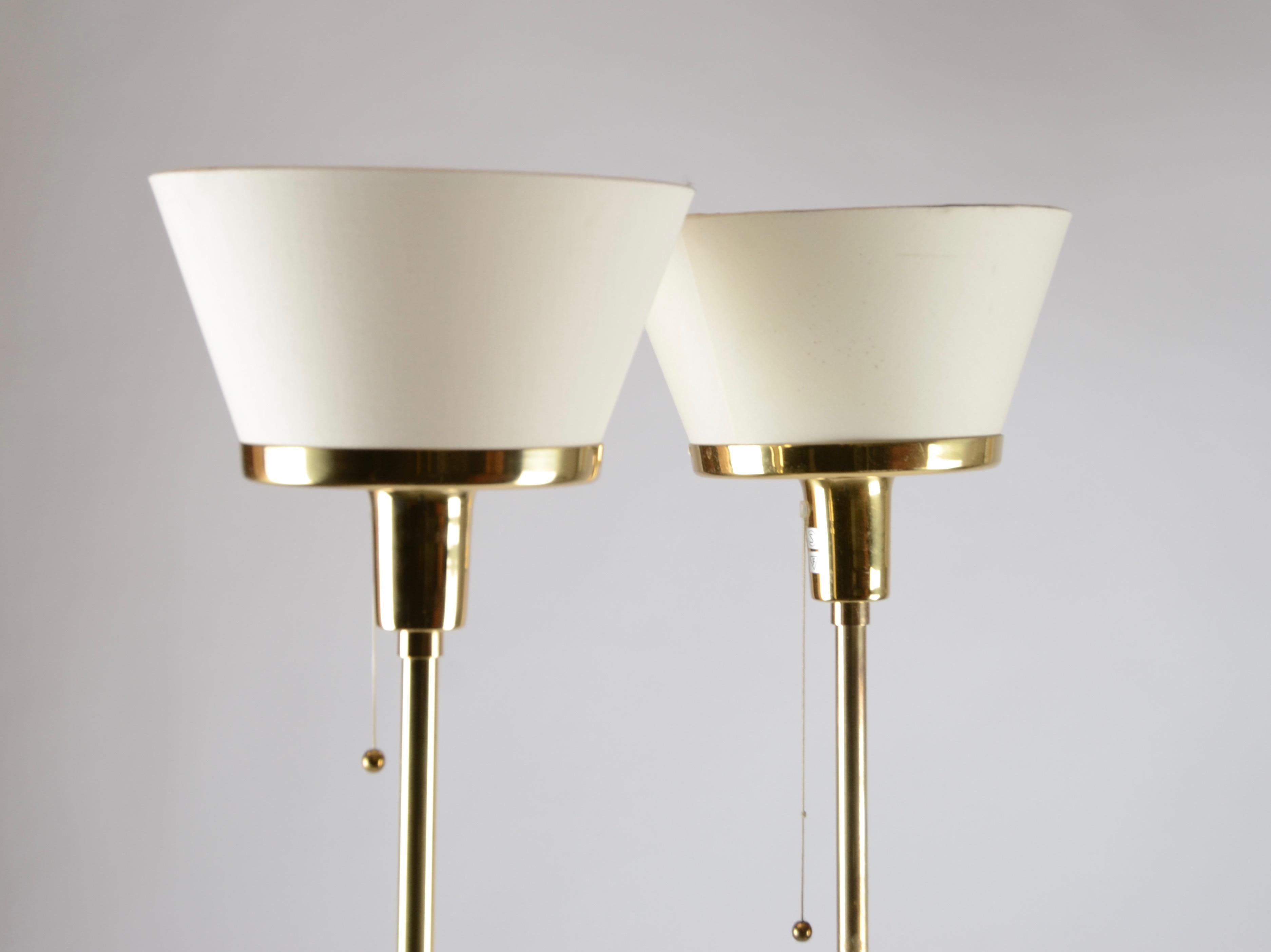 A pair of floor lamps model 2424, designed by Josef Frank in 1939 for Firma Svenskt Tenn.