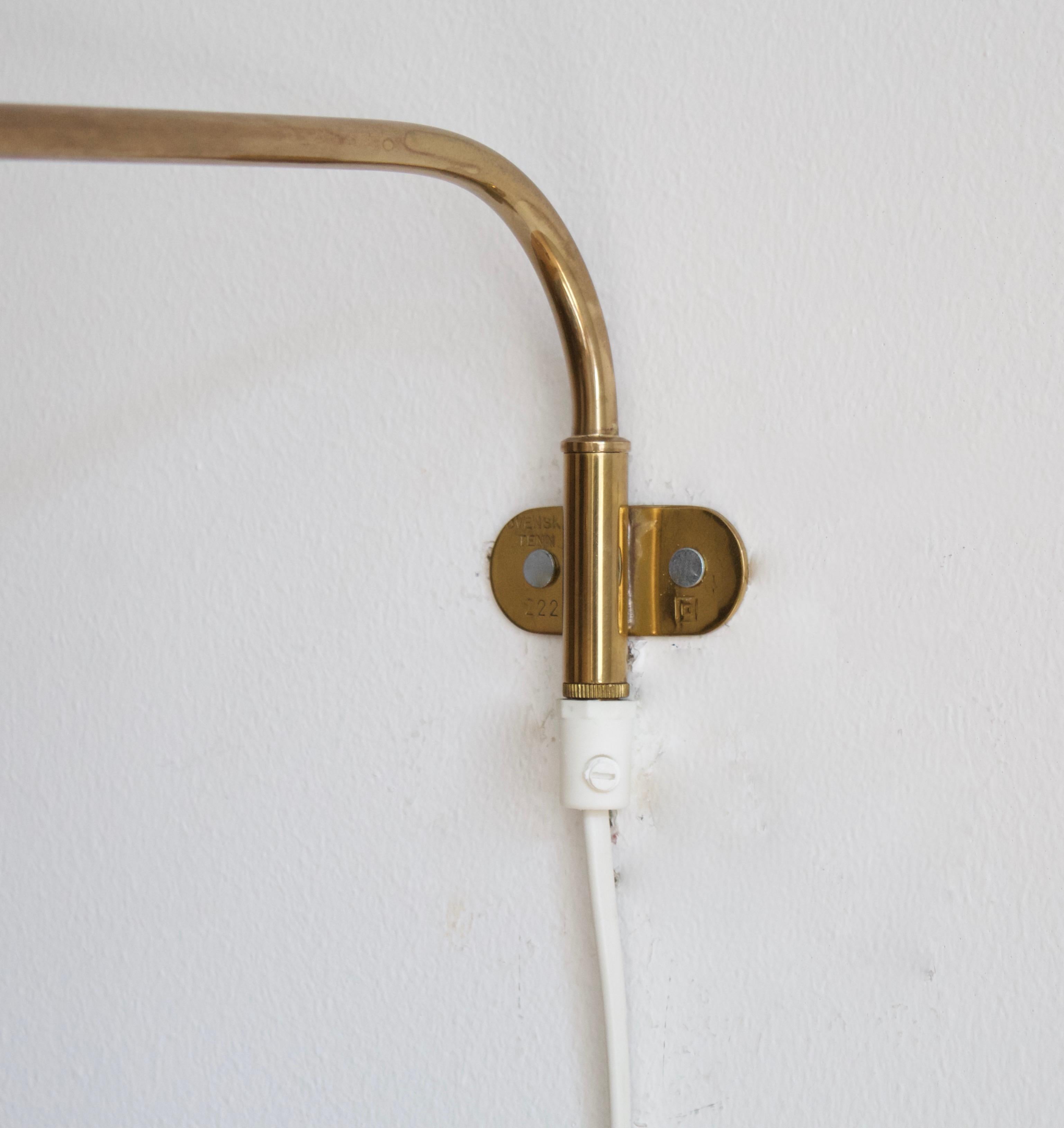 Mid-Century Modern Josef Frank, Adjustable Wall Light, Brass, Rattan, Svenskt Tenn, Sweden, 1950s