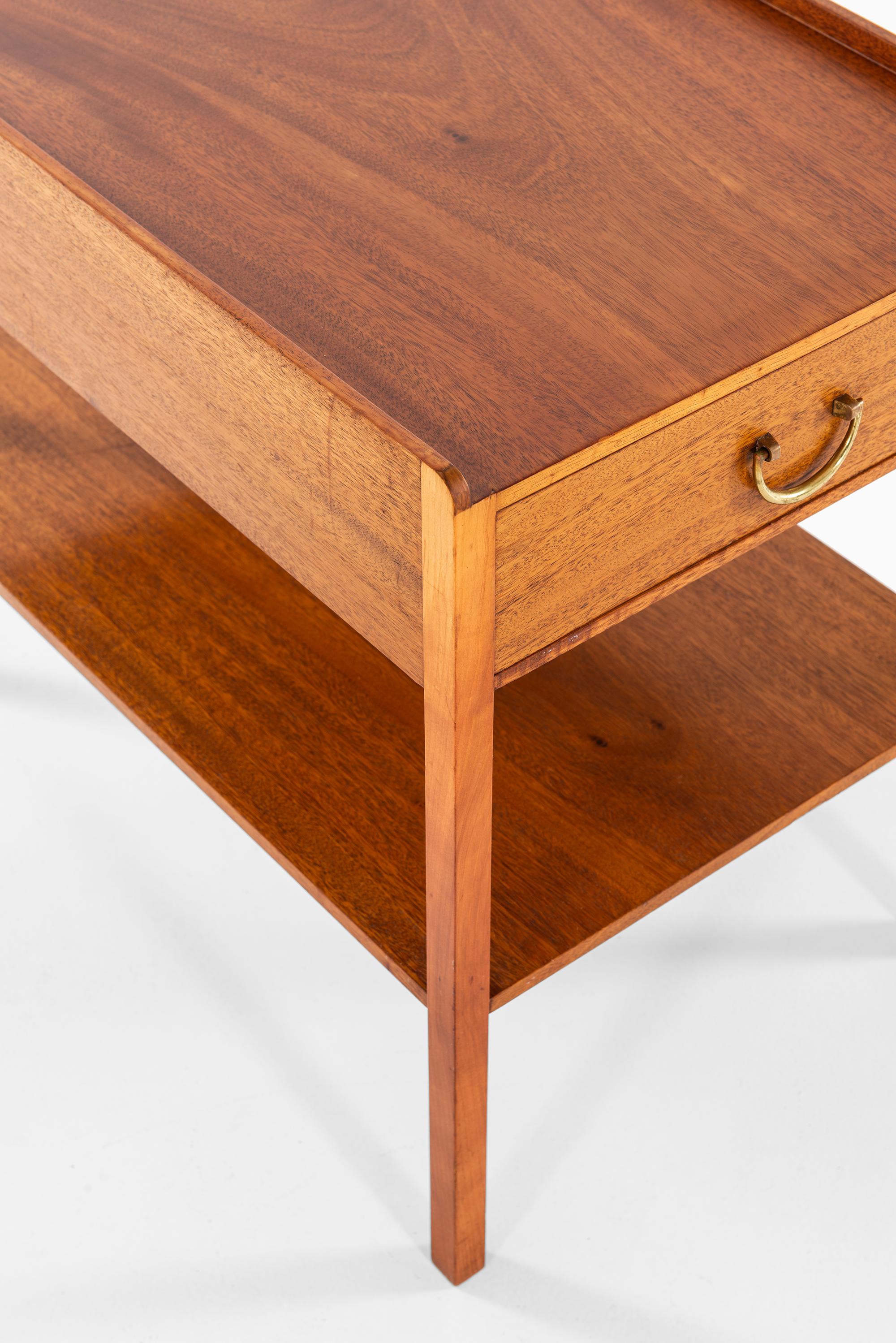 Bedside / side table designed by Josef Frank. Produced by Svenskt Tenn in Sweden.