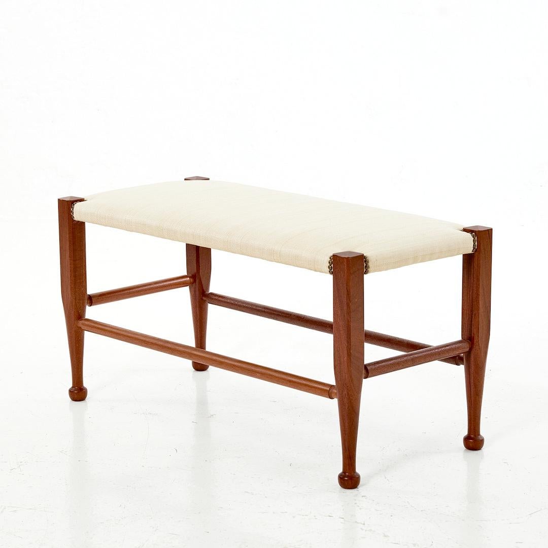 Josef Frank & SCANDINAVIAN MODERN

A beautiful bench by Josef Frank, for Svenskt Tenn, Sweden, 1960s. 

The frame is made of mahogany, upholstered seat with brass nails. The feet are elegantly sculpted and the bench can also be used as a table,