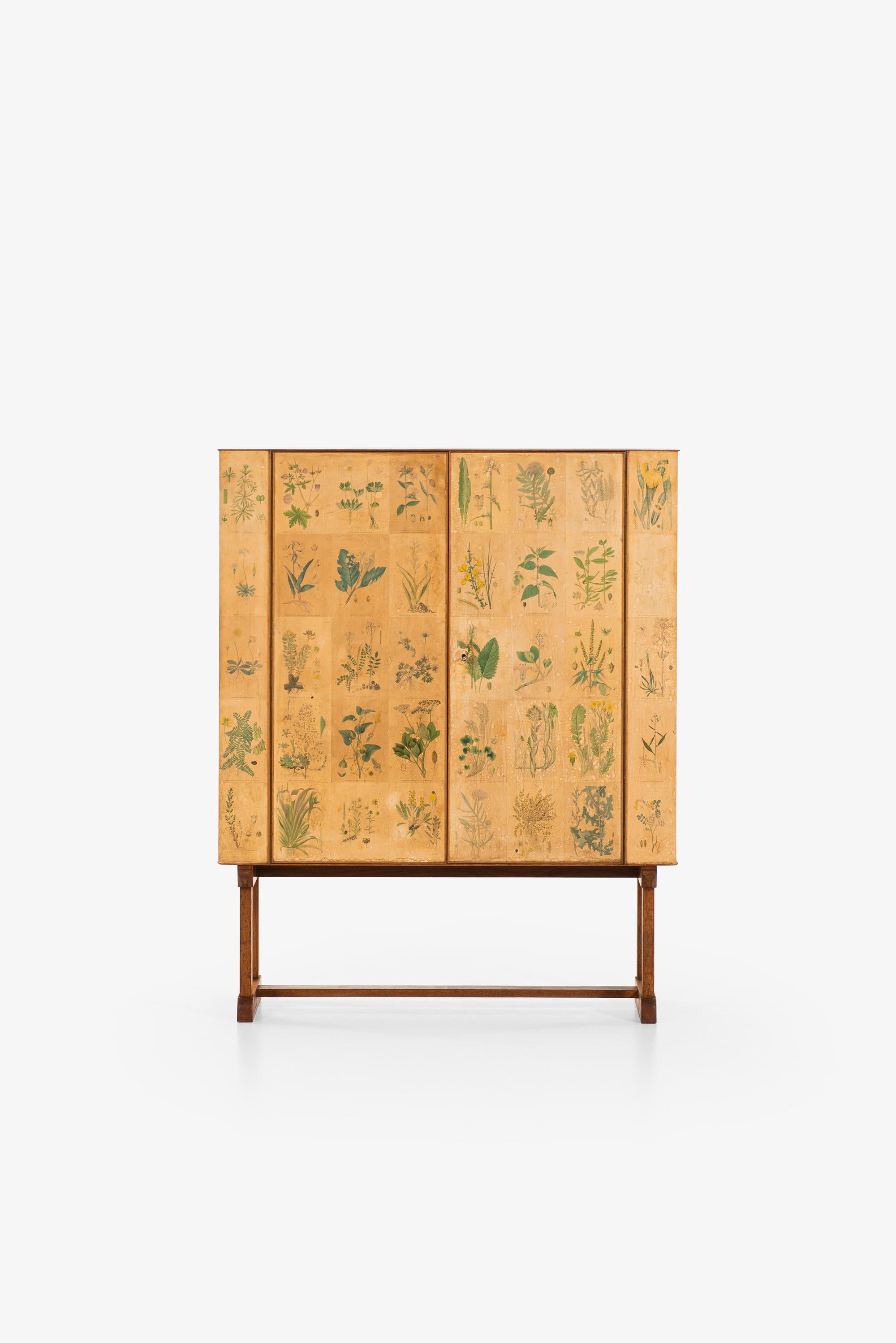 Very rare and early 1st edition of Flora / model 852 cabinet designed by Josef Frank. Produced by Svenskt Tenn in Sweden.
