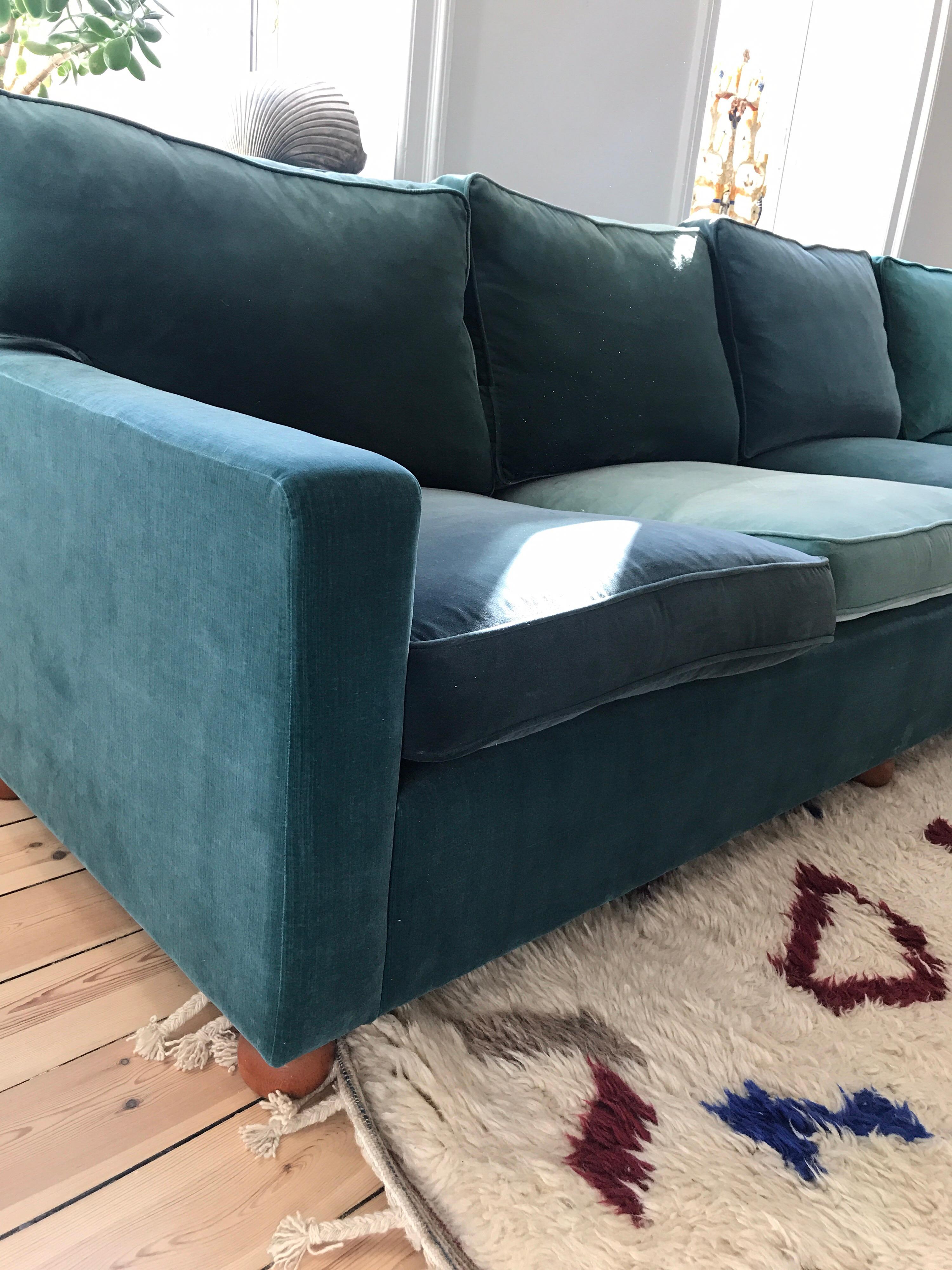 Josef Frank, five seated sofa in seven shades 

Material: Base of nozag feathers, padded with cold foam / polyether and synthetic batting. Cushions with polyether core, wrapped with synthetic fiber / feathers. Globe-shaped legs in stained