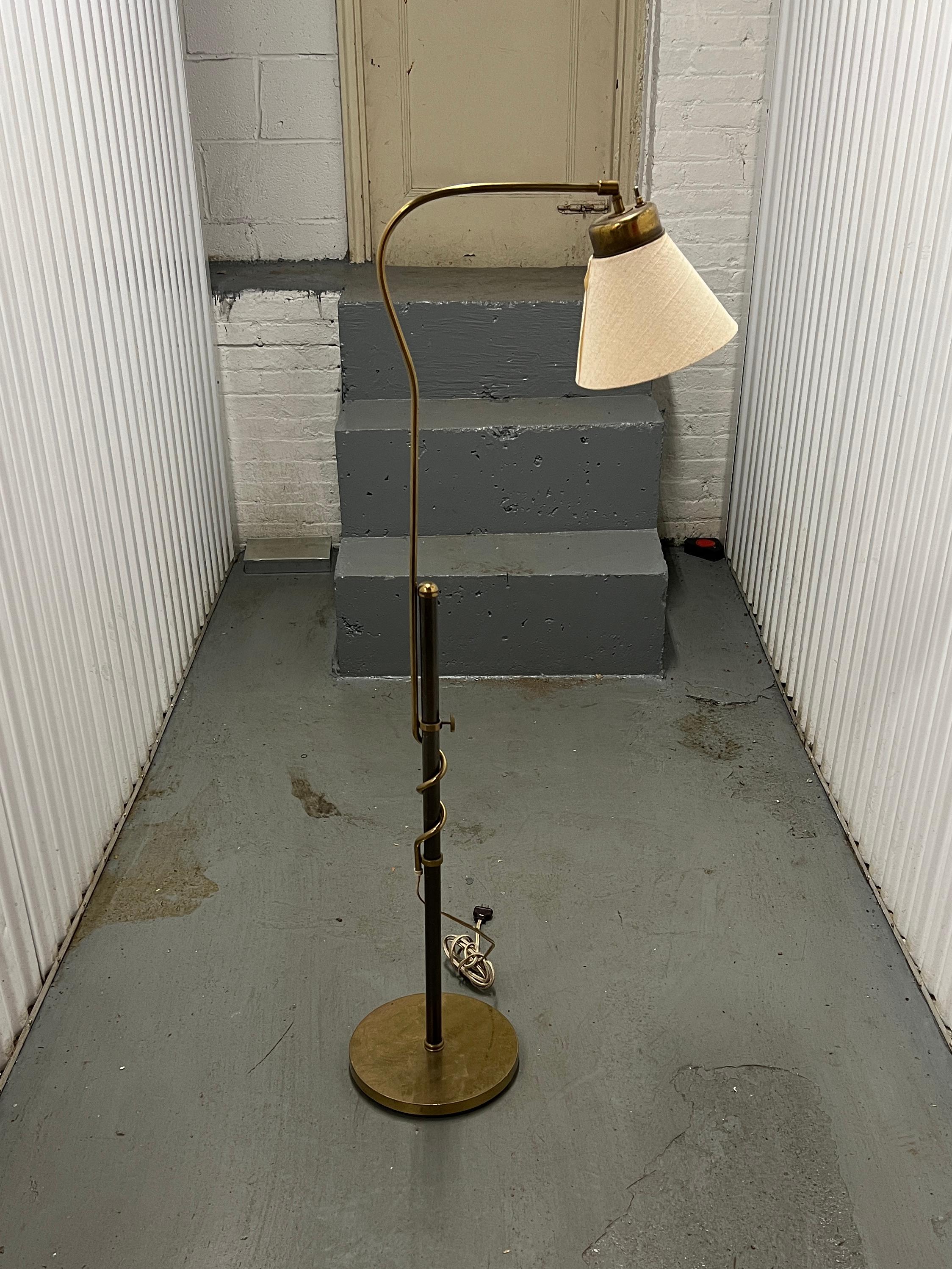 Josef Frank adjustable floor lamp with unique gooseneck curved shaped, produced by Svenskt Tenn in brass, nickel-plated steel with linen shade. 38H × 19W × 12D (fully extended: 57¾H × 19W × 12D). See pics for illustrated related example from