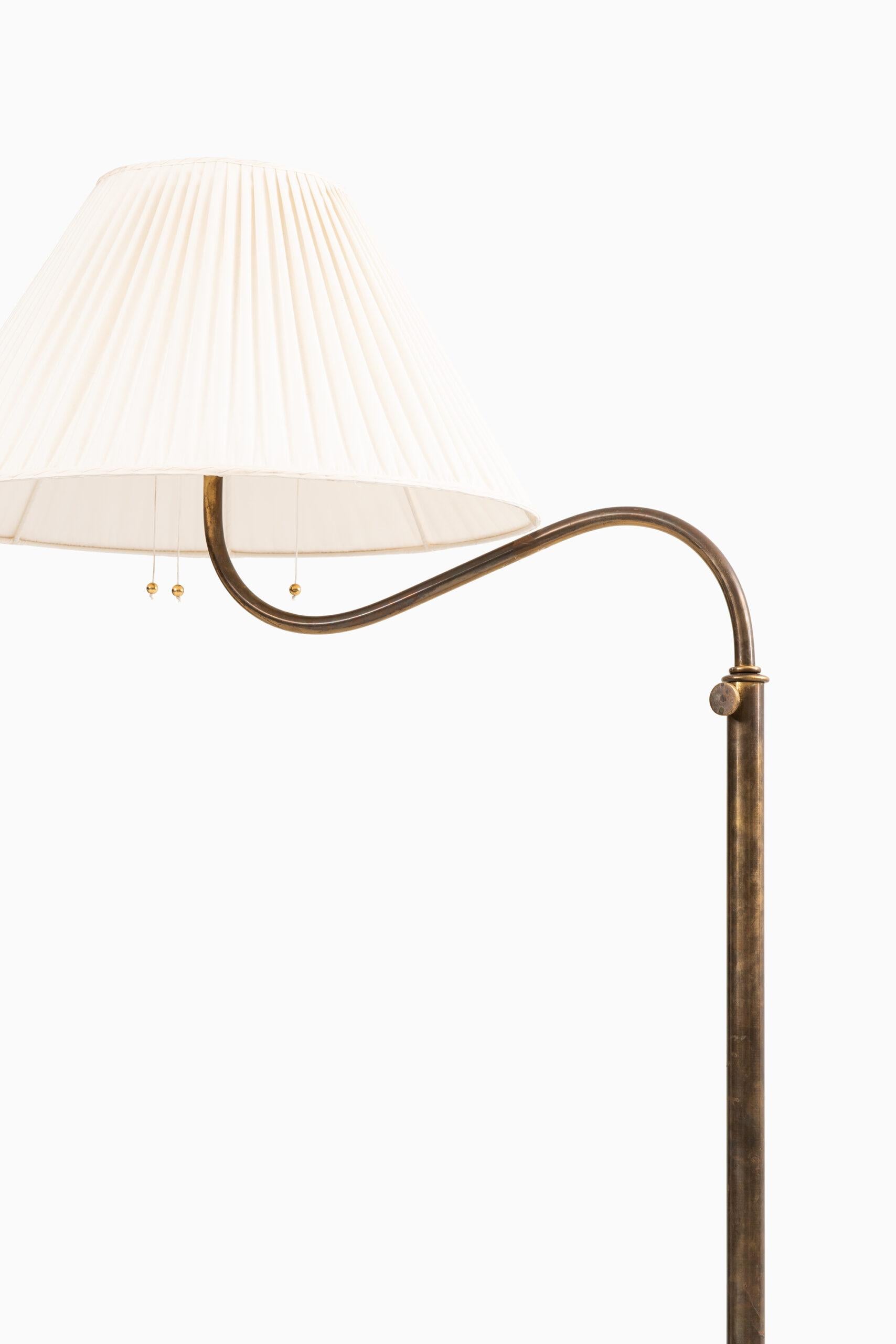 Rare height adjustable floor lamp designed by Josef Frank. Produced by Svenskt Tenn in Sweden.