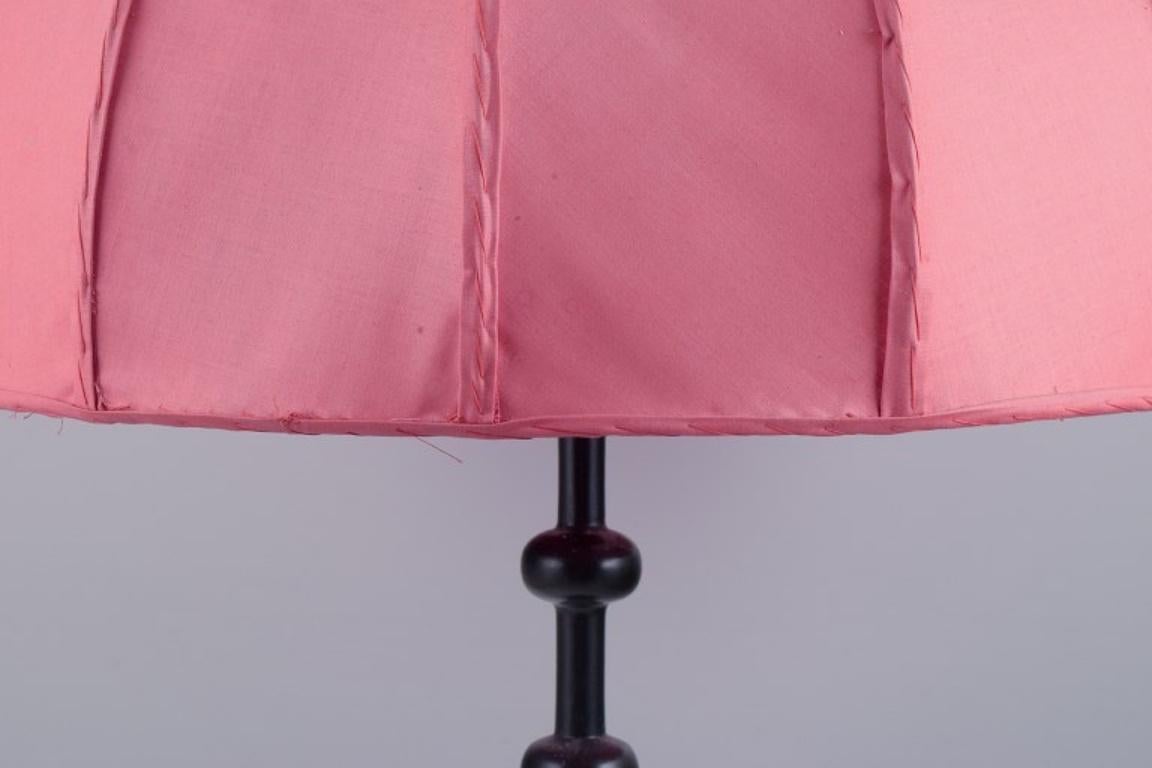 Josef Frank for Svenskt Tenn, Sweden.  Large table lamp with pink fabric shade. For Sale 1