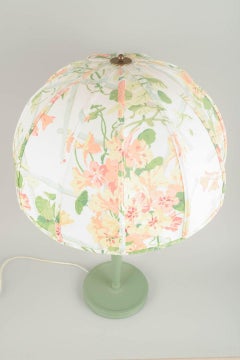Josef Frank for Svenskt Tenn. Table lamp, turned wooden base and floral shade.