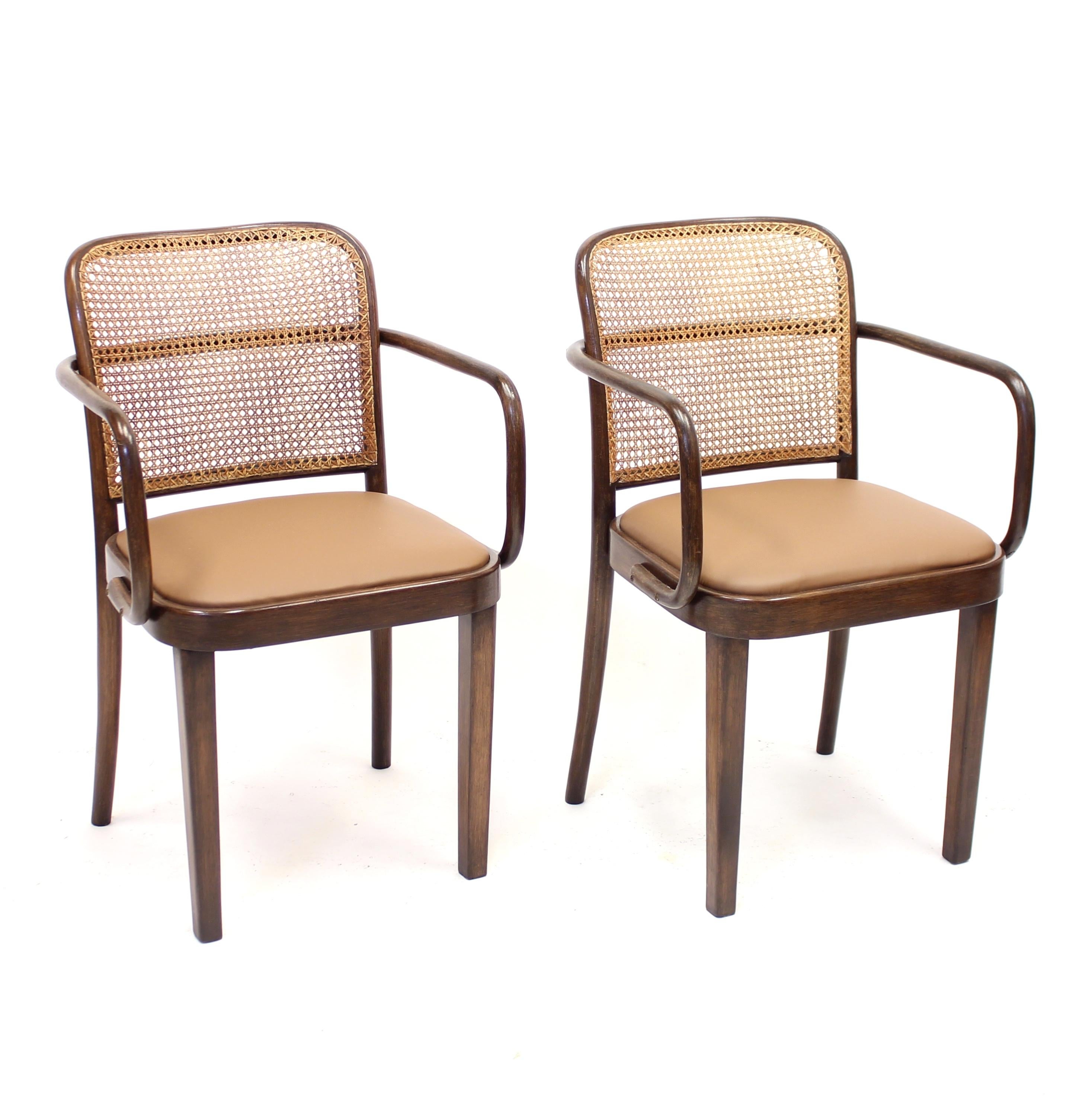 Pair of bent wood armchairs, model A 811/1 F designed by Josef Frank or Josef Hoffamnn in the 1930s. It's not established to this day which of the the two gentlemen who actually designed this model, who also exist without the armrests. The