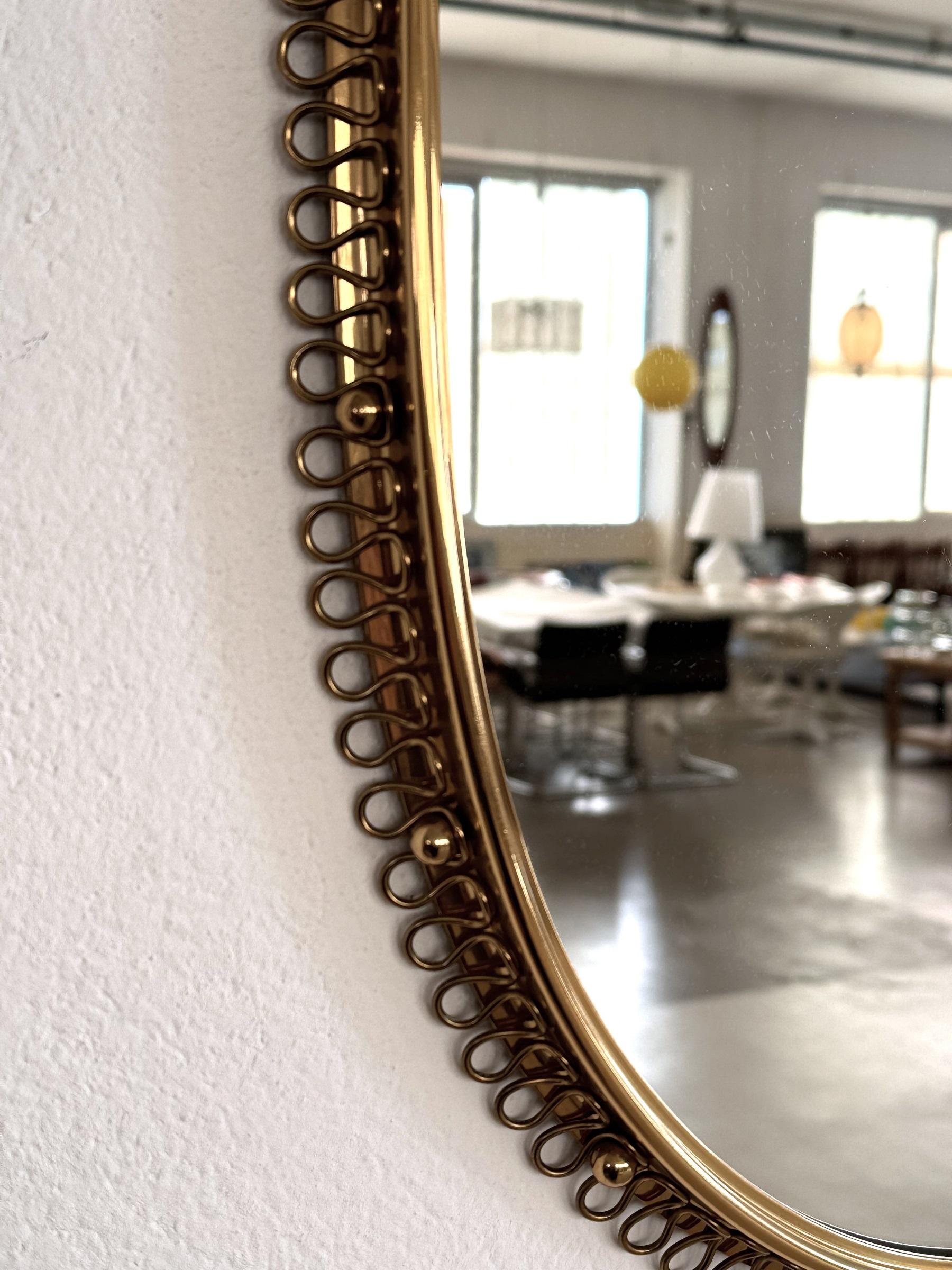 Hand-Crafted Josef Frank Mid-Century Brass Loop Wall Mirror with Hook for Svenskt Tenn, 1960s