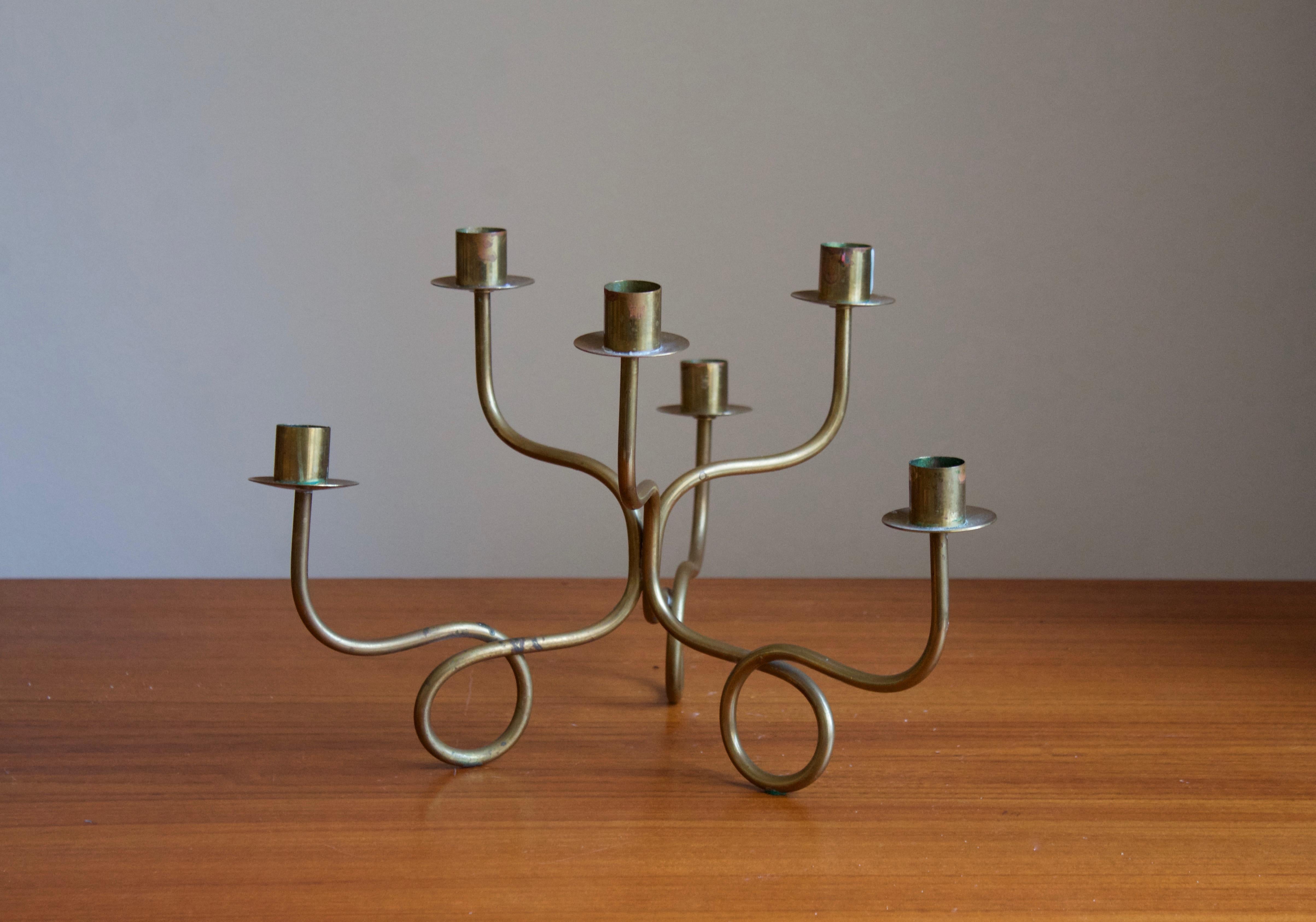 An organic modernist candelabra that holds 6 candles. Designed by Josef Frank for Svenskt Tenn. Produced in 1950s.

Other designers of the period include Paavo Tynell, Kaare Klint, Hans Agne Jacobsen, and Alvar Aalto.