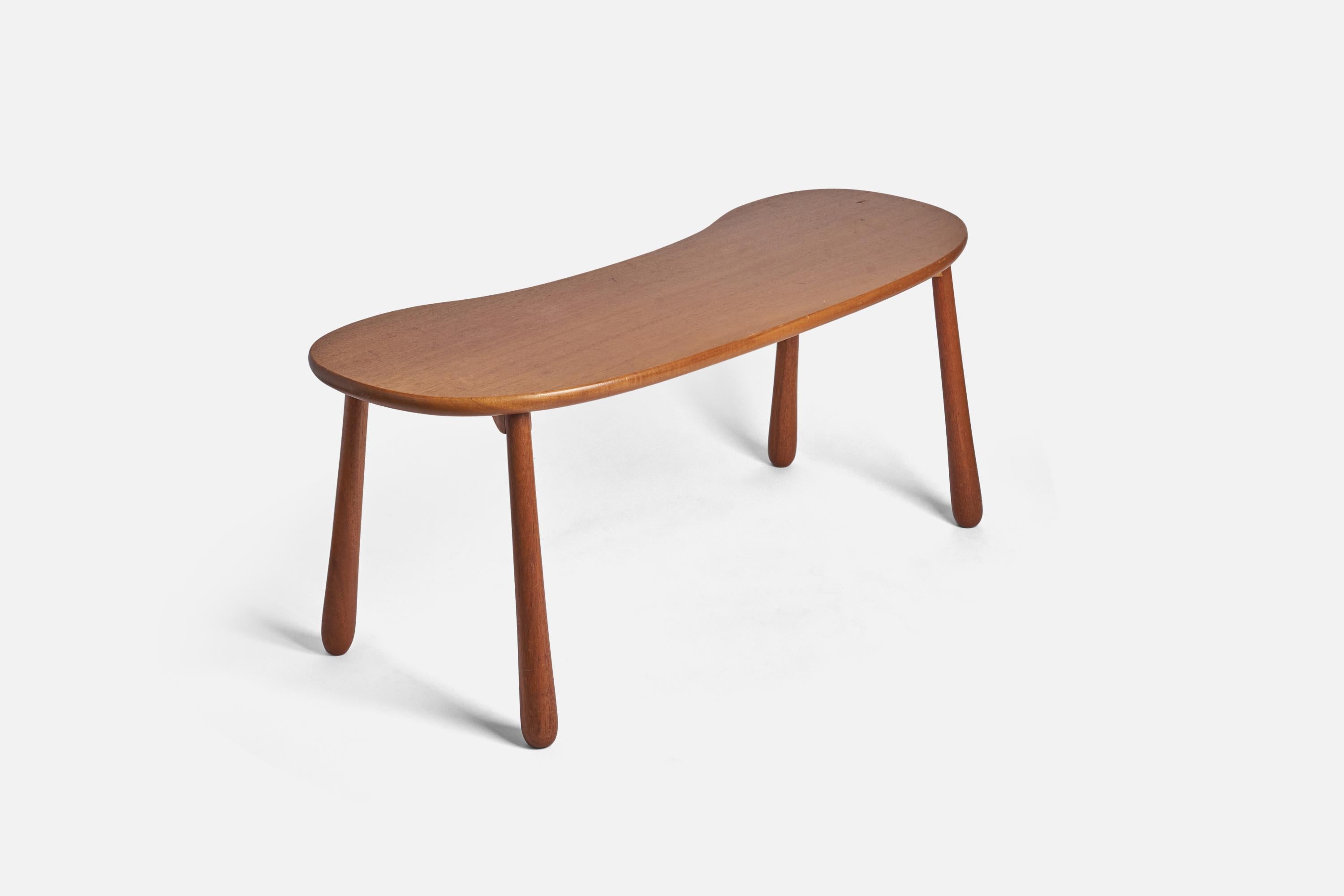 A mahogany stool or bench designed by Josef Frank and produced by Svenskt Tenn, Sweden, 1970s. 

