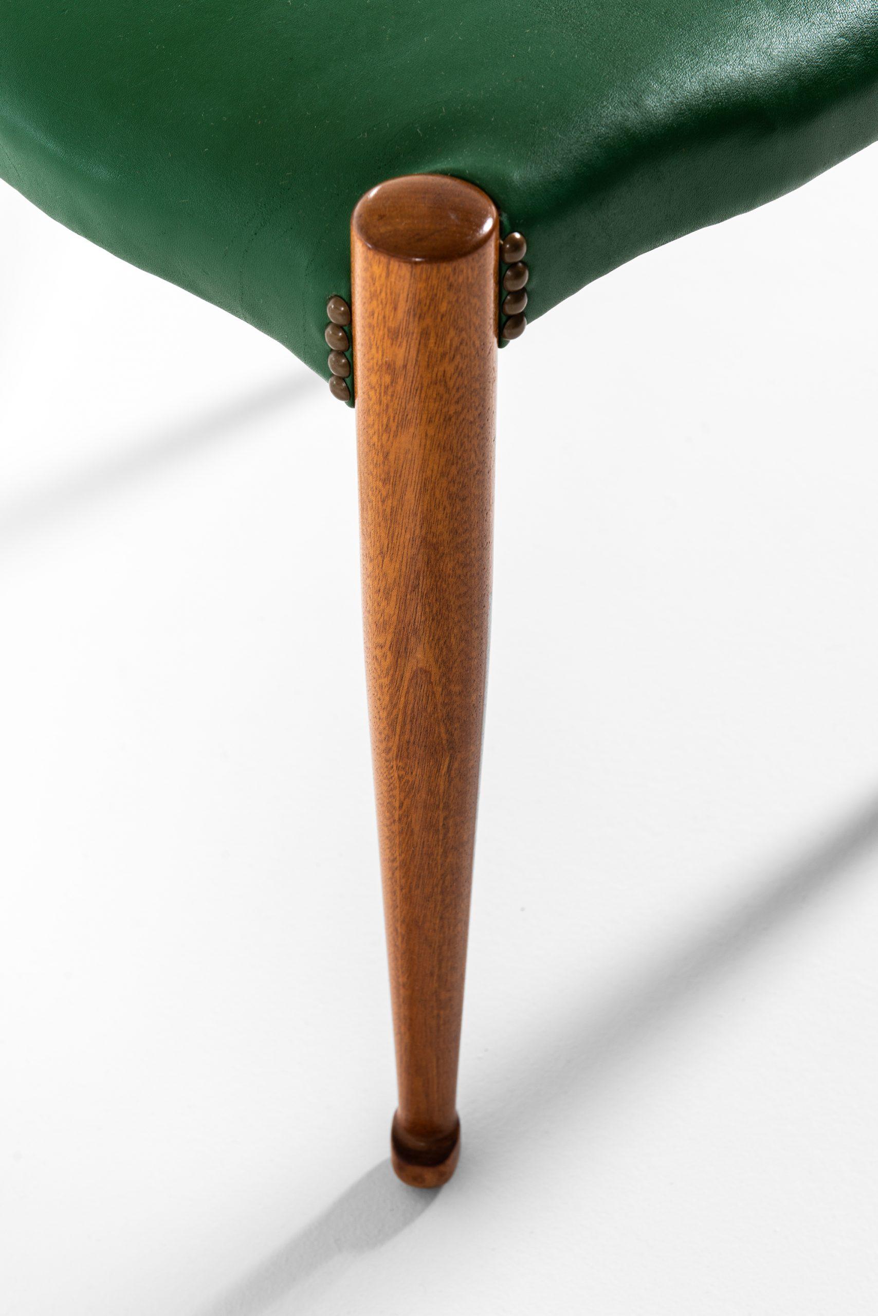 Rare pair of stools model 973 designed by Josef Frank. Produced by Svenskt Tenn in Sweden.