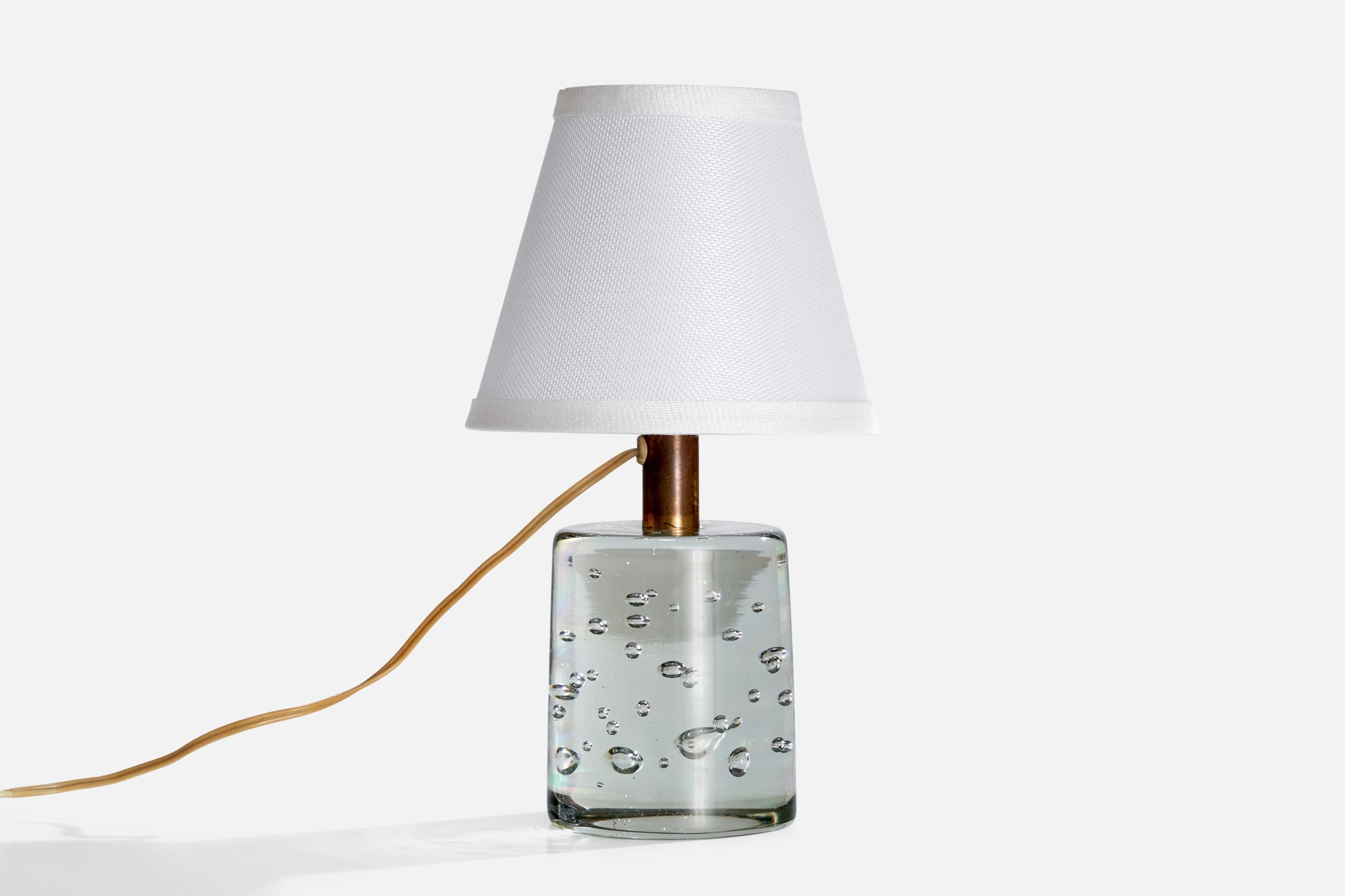 A brass and blown glass table lamp designed by Josef Frank and produced by Svenskt Tenn, Sweden, c. 1950s.

Dimensions of Lamp (inches):  9.125“ H x  4.25“ diameterDimensions of Shade (inches):  4“ Top Diameter x  7“ Bottom Diameter x  6“