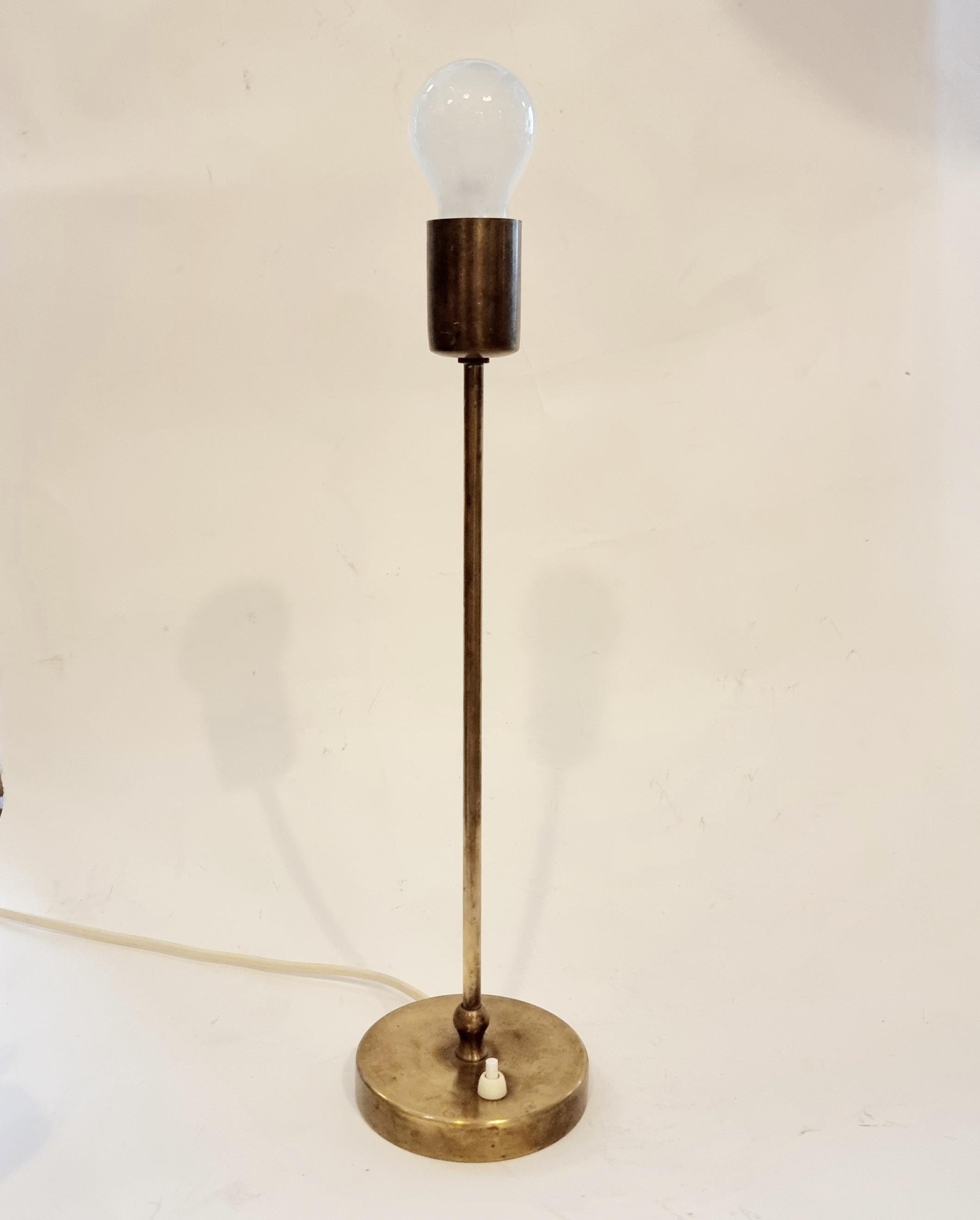 Josef Frank table lamp, model 3223. Designed in 1932 for Firma Svenskt Tenn. 

In solid brass, marked Svenskt Tenn 3223. This example is made during mid-1900s.