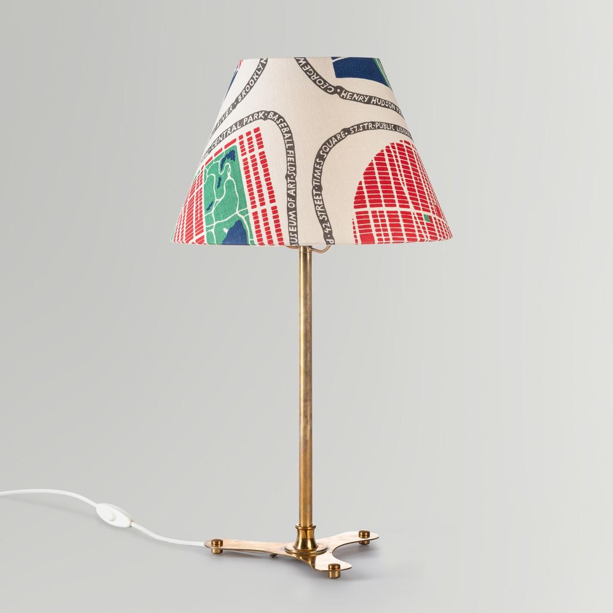 Brass table lamp, model 2467, designed by Josef Frank for Svenskt Tenn in Sweden, 1950s.

This elegant and rare Swedish table lamp was designed in the 1950s by renowned Austrian-born architect and designer Josef Frank for Svenskt Tenn. The lamp