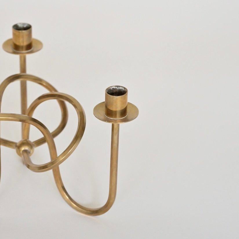 Vänskapsknuten (the Knot of Friendship) brass candle holder designed by Josef Frank Candlestick for Svenskt Tenn. Sweden, 1930’s.