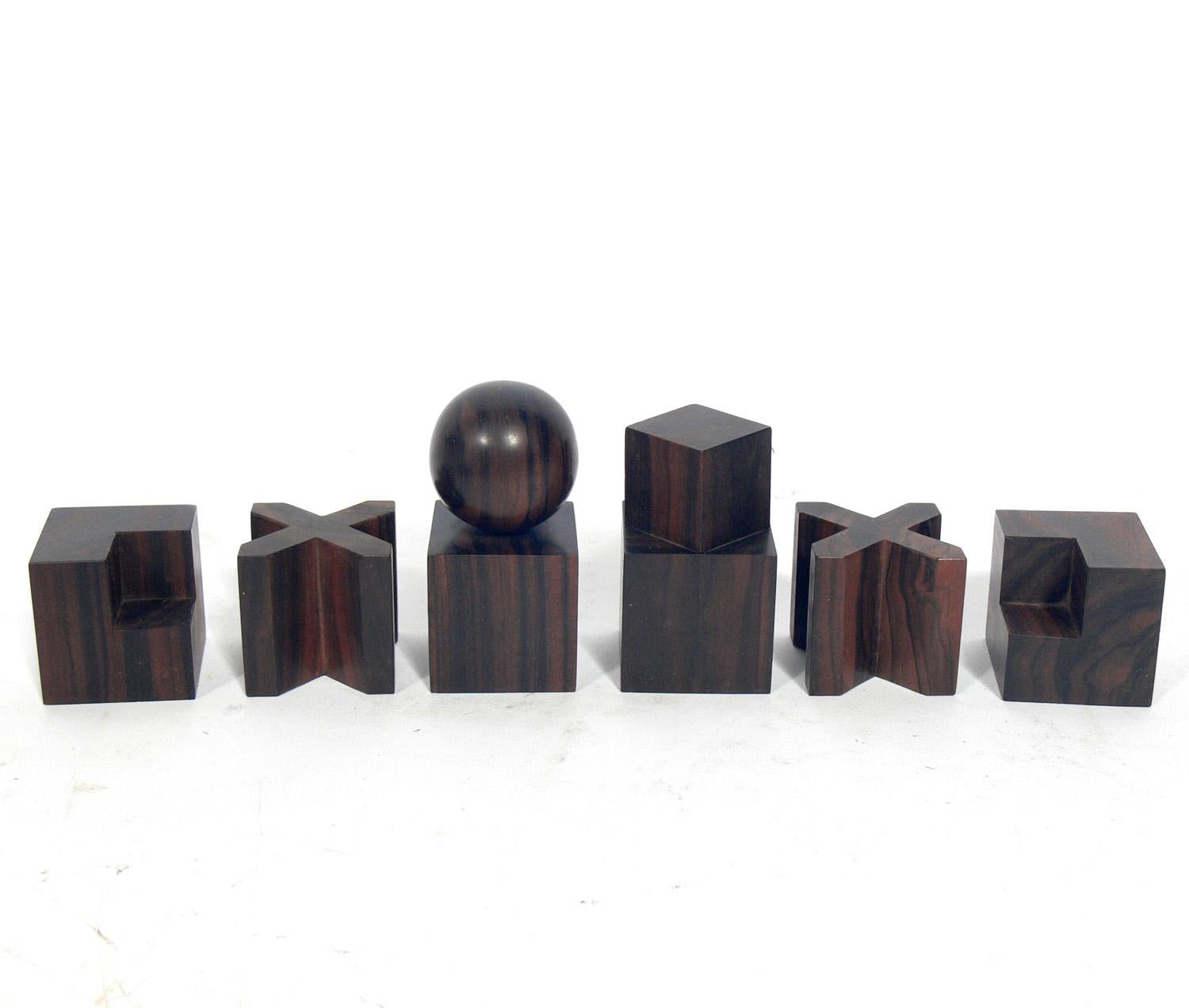 Modernist chess set, originally designed by Josef Hartwig at the Bauhaus, circa 1920s. This set is a later example, probably circa 1960s. It is a larger scale construction and crafted in beautifully grained rosewood and walnut. The tallest pieces