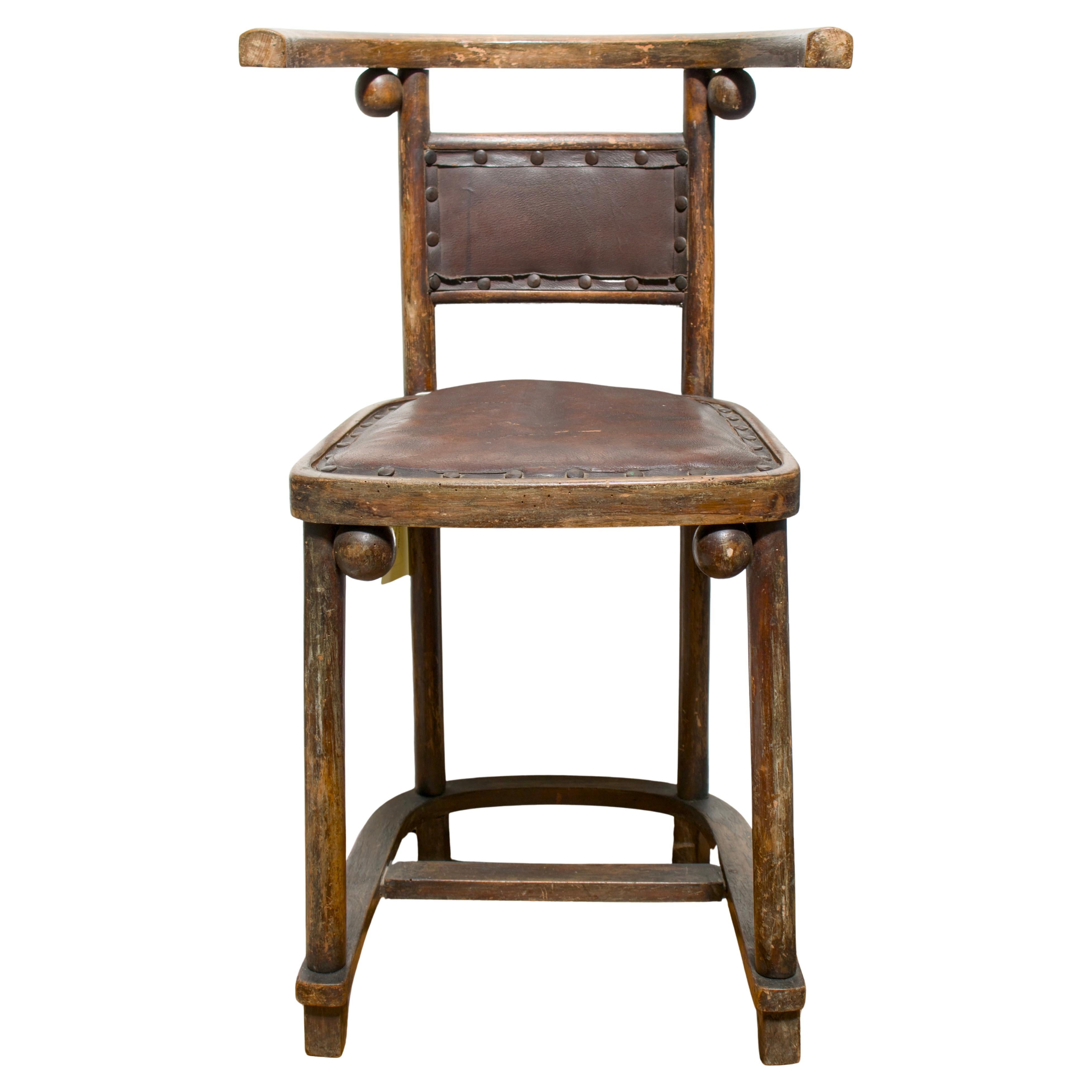 Josef Hoffman “Fledermaus” wood and brown leather armchair For Sale