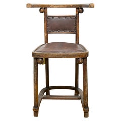Josef Hoffman “Fledermaus” wood and brown leather armchair