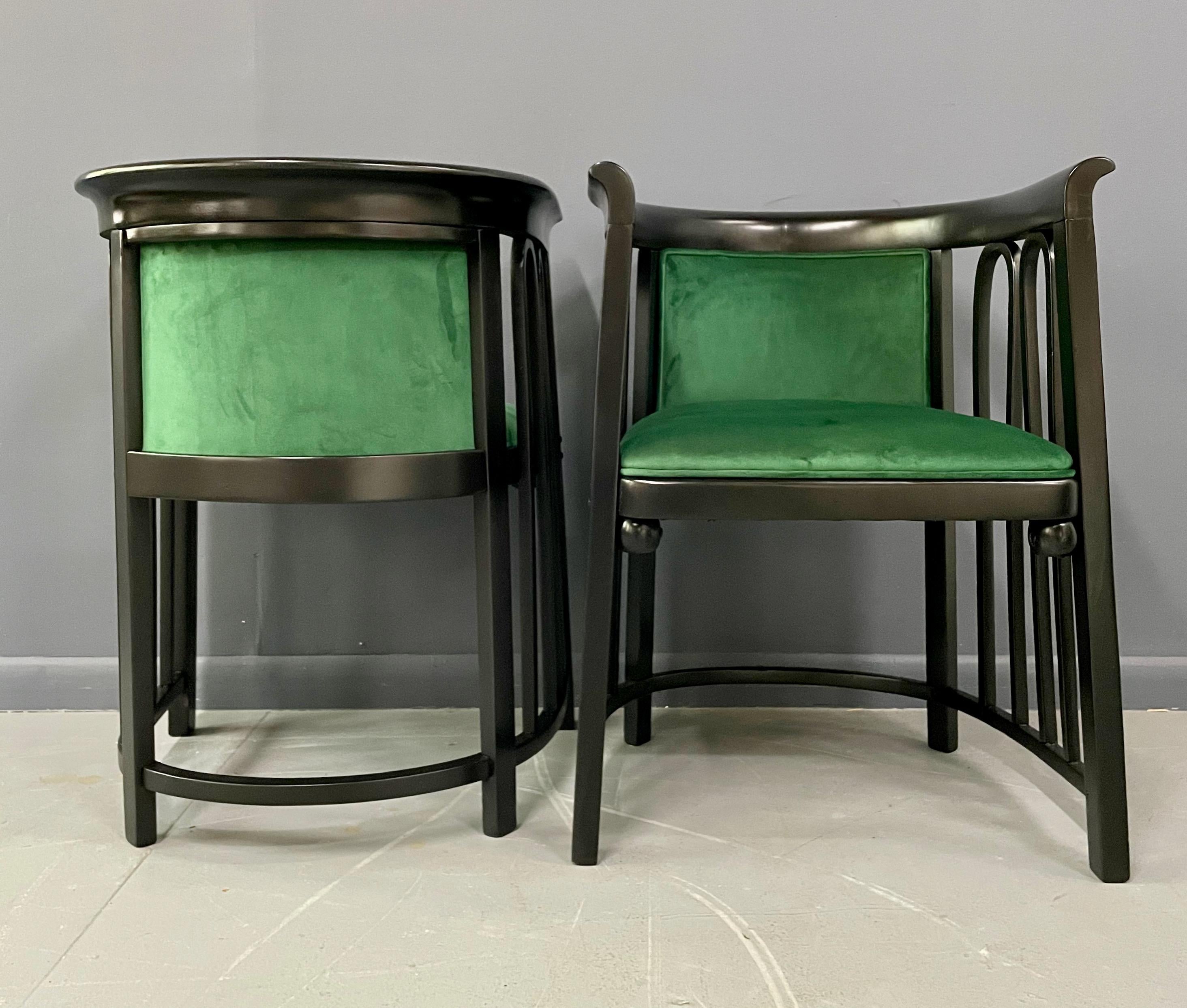 These lounge chairs from the early 1900s have an unusual bentwood design that makes them extremely rare. They have been totally refinished and reupholstered.