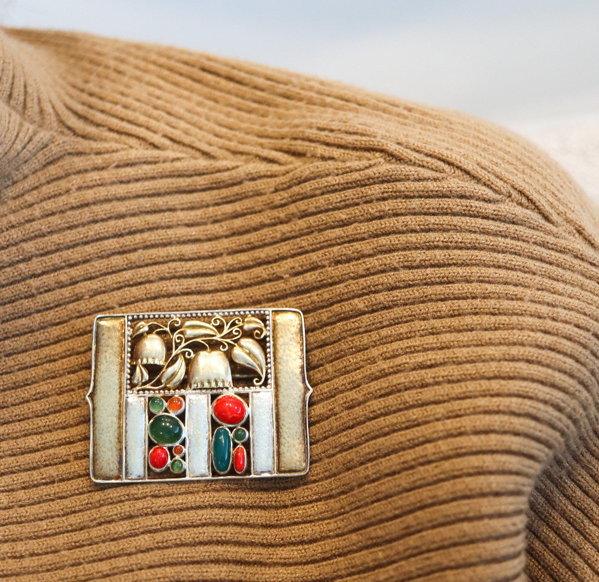 A Bell-Flowers brooch designed by Josef Hoffmann (1870-1956).

This is an exceptional Bell-flowers brooch, originally designed in Vienna Austria by Josef Hoffman, back in 1911. The iconic brooch has been masterfully crafted in the art & crafts style