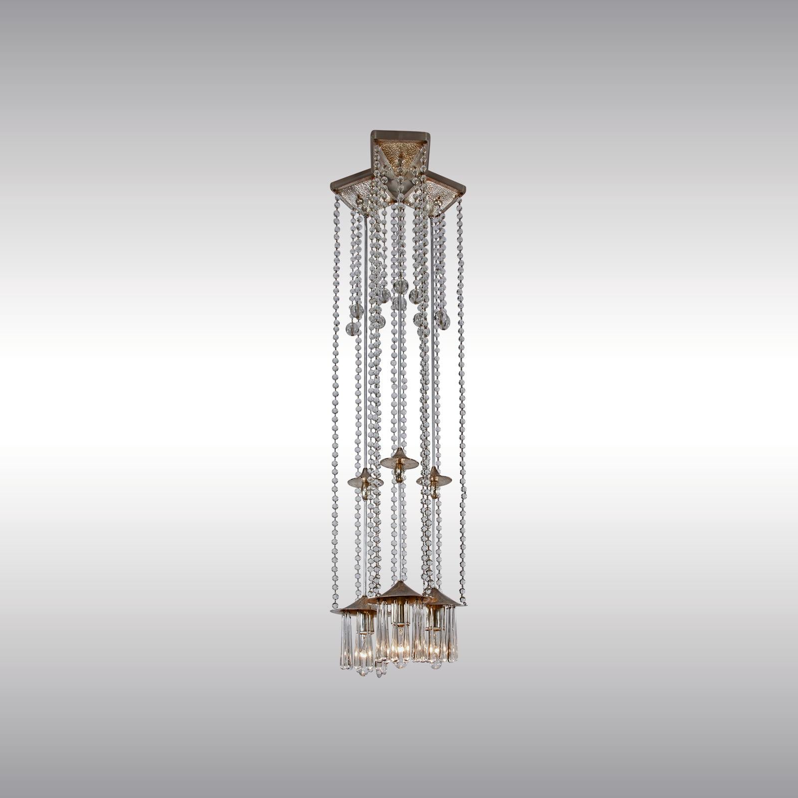 Important design by Josef Hoffmann and the Wiener Werkstätte for the apartment Dr Hermann Wittgenstein in Vienna, Salesianergasse consists of three single pendants combined to a chandelier. Single pendants are as well available. Hammered, chased