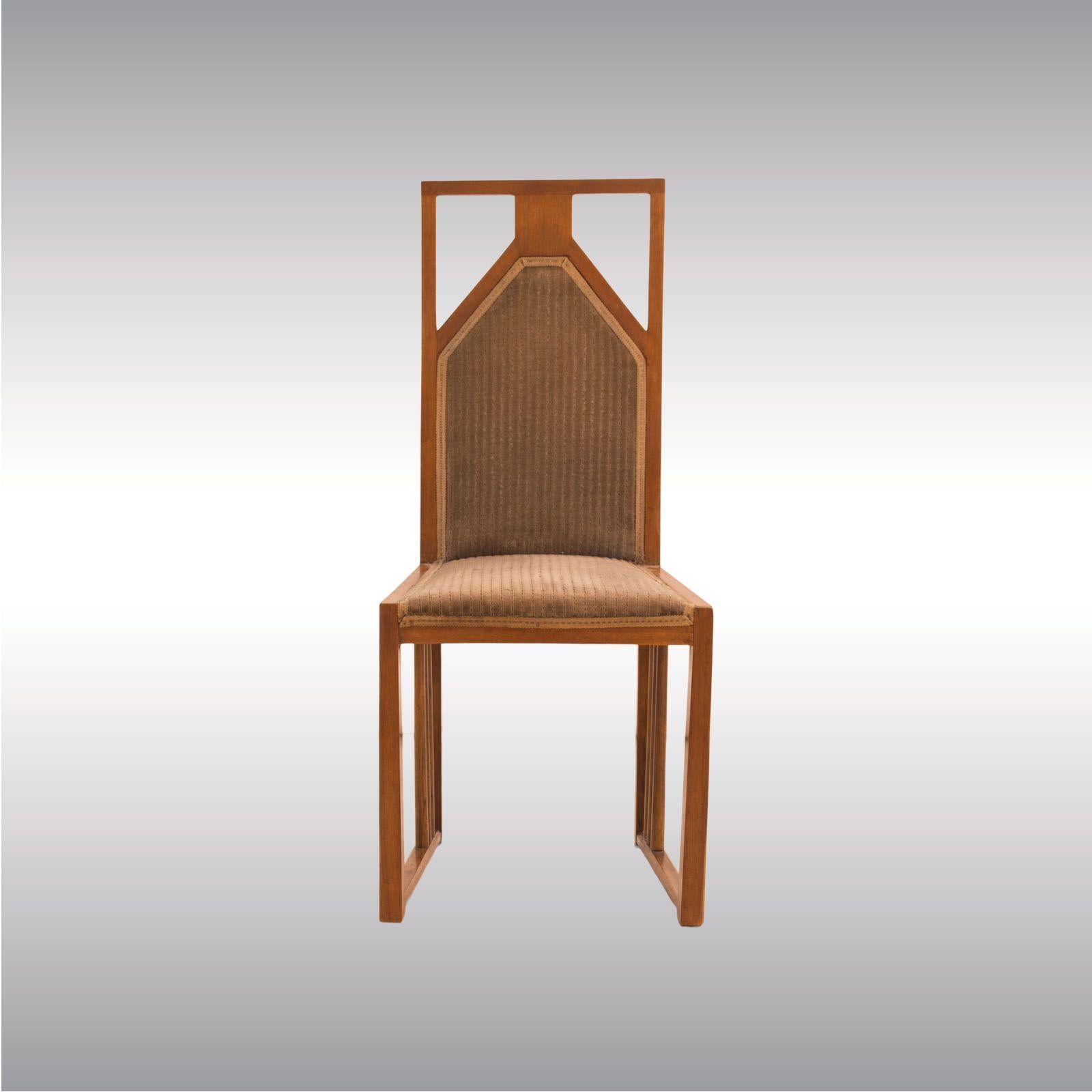 A pair of extraordinary chairs in the style of the early Josef Hoffmann furniture. The significant skids were used by Hoffmann in the early years of the Wiener Werkstätte from 1903 on. Decorative columns, high back-rest with a geometric pattern. Can