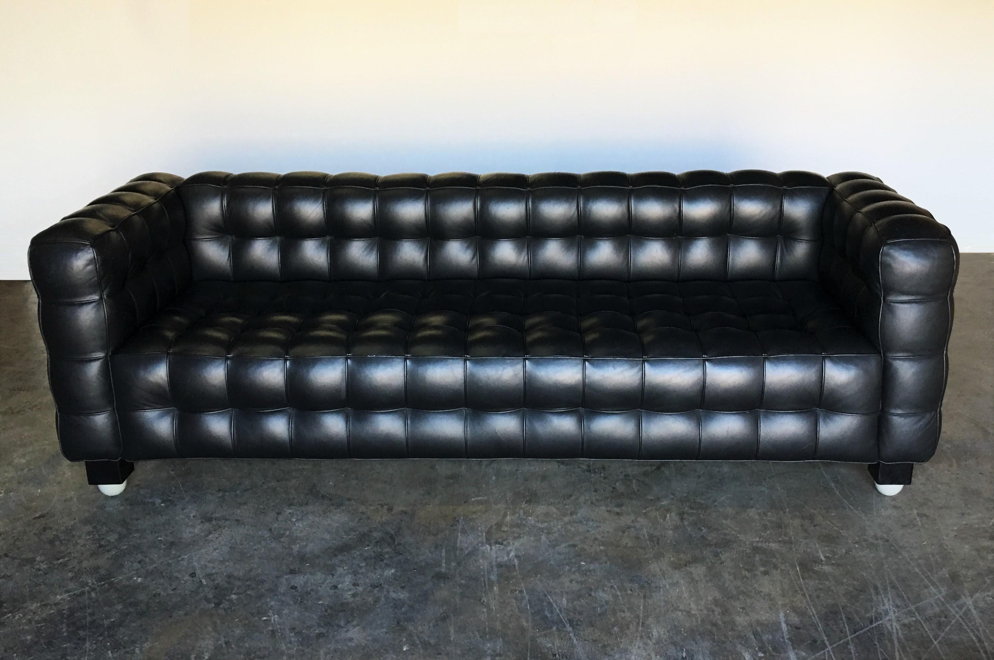 Great geometric sofa designed by Josef Hoffmann, manufactured by Wittmann, Austria, circa 1999. The sofa was designed in 1910 and later Wittmann took it into production. This sofa is made of black leather and is quality finished all-over. Made of