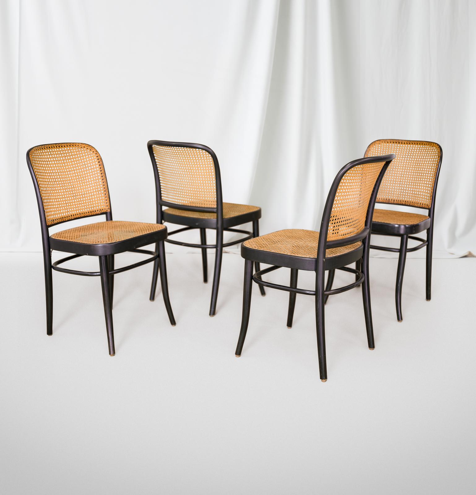 Josef Hoffman black 811 Prague chair. Made in Czechoslovakia and imported by Stendig. Chairs have original caning and paint. Bentwood and caned seat and back. Chairs are in great vintage condition with some light scratches and scuffs from age and