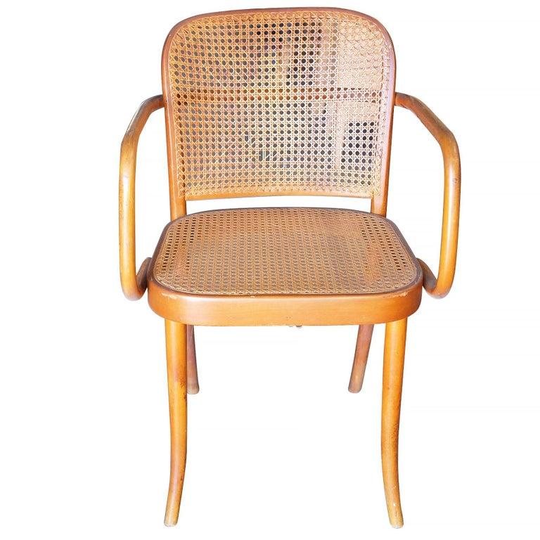 This Stendig cane armchair with bent beech-wood frame and handwoven cane seat is attributed to Josef Hoffmann. Made in Czechoslovakia and signed on the bottom. 

Professionally restored in May/2019.

 
