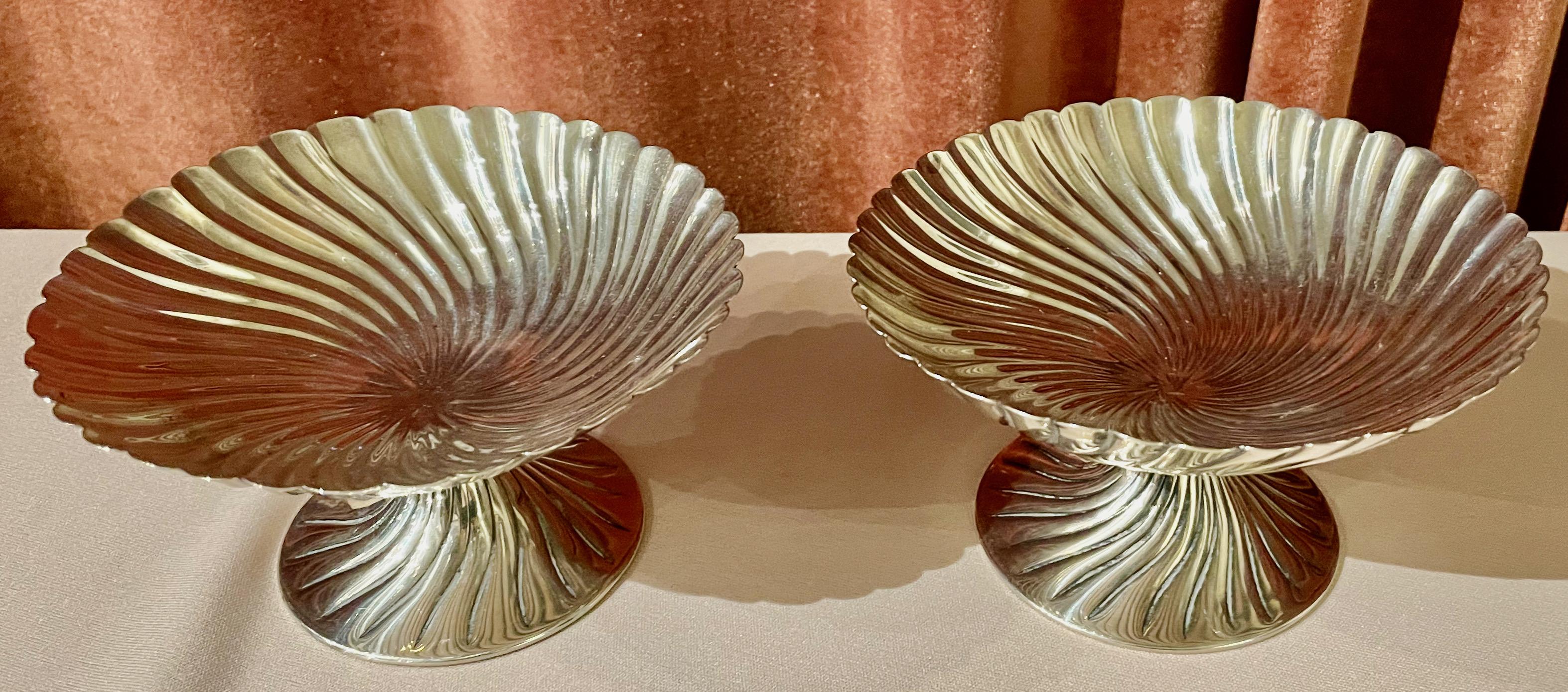 Josef Hoffmann for Wiener Werkstatte Vienna circa 1920 silver dish pair. A quality pair of dishes or bowls hand chased, made of silver and hallmarked on the side top. Manufacture: ‘Wiener Werkstätte’ ’Vienna Workshop’ Dating: circa 1920.

Josef