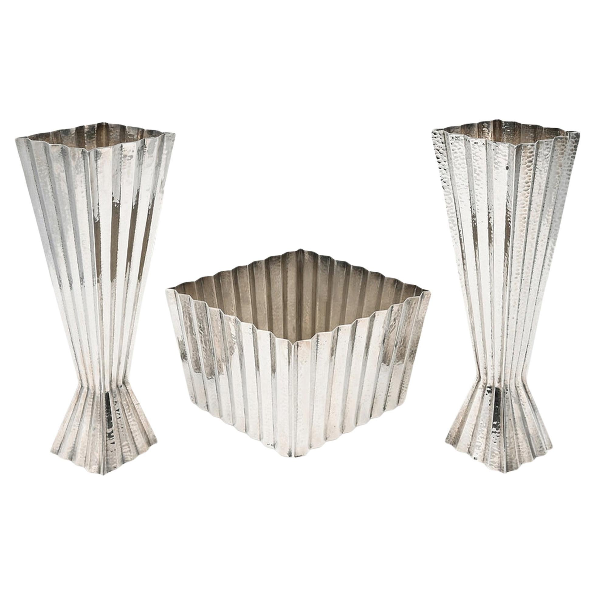 Josef Hoffmann Hammered Silver Centerpiece and Pair of Vases For Sale