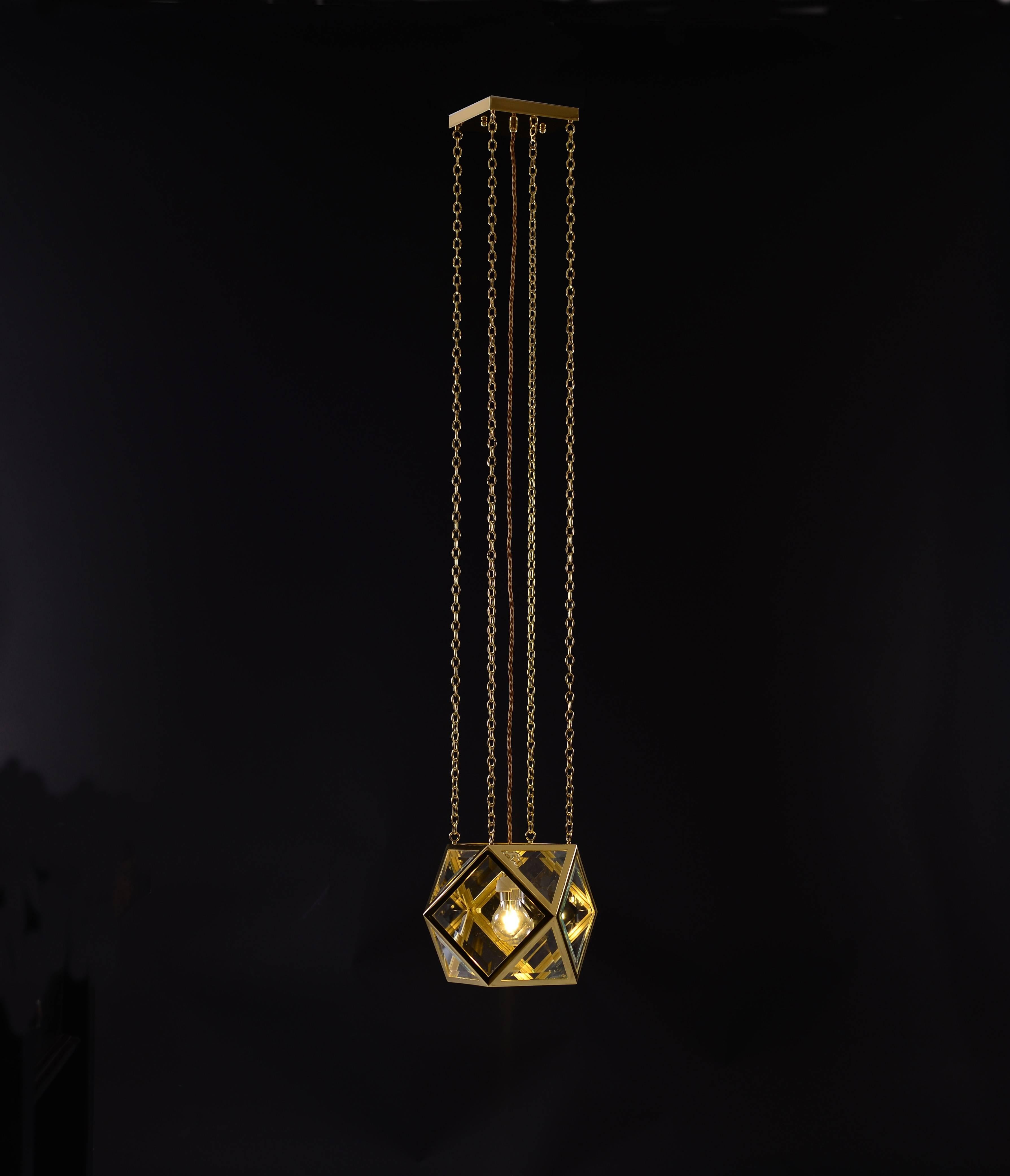Very important early design by Josef Hoffmann.
See figure: The Studio 1906, C14 Art Revival in Austria
brass, crystal-glass, opaline-glass on the chain.

Length custom-made

All components according to the UL regulations, with an additional charge