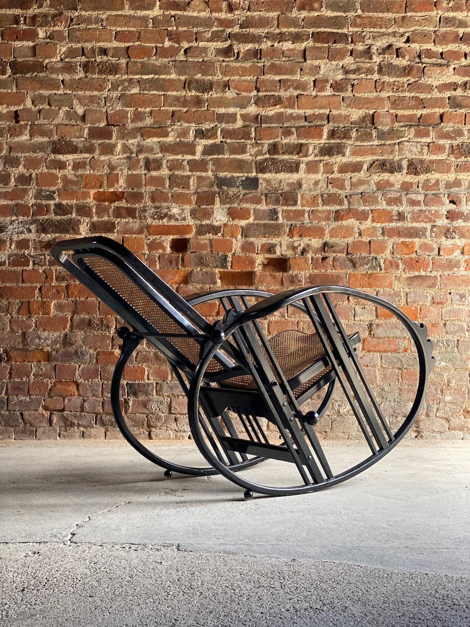 Josef Hoffmann No.267 egg rocking chair by Antonio Volpe Italy circa 1980

Rare Model No. 267, ‘Egg’ rocking chair circa 1980 in black lacquered beech bentwood and viennese woven rattan designed by the great architect Josef Hoffmann in1922, the