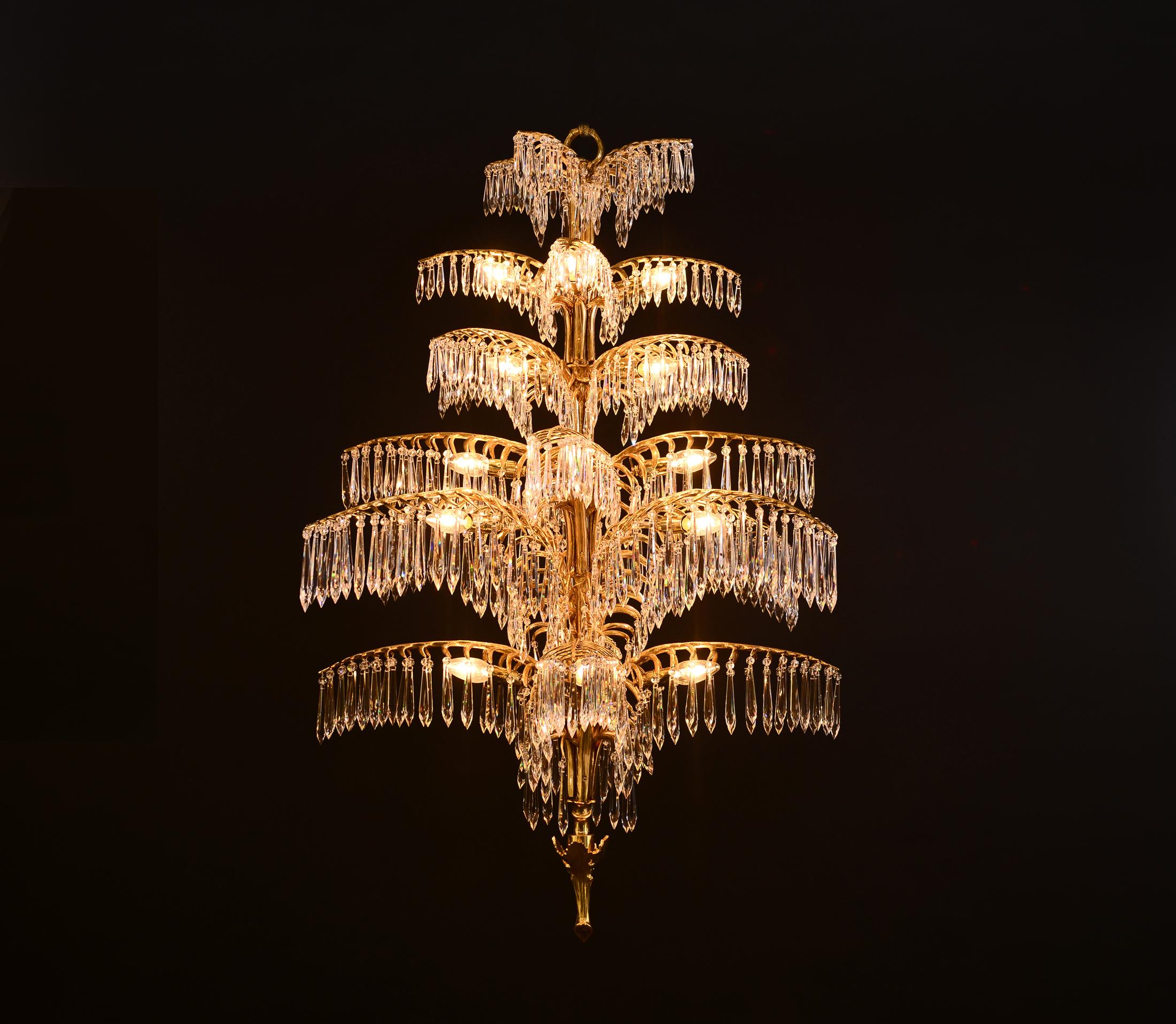 This is a larger version of the famous Josef Hoffmann Palme.  
Material used is brass in any finish, crystal-glass.
Custom-made production at the Woka Lamps Workshop in Vienna.
Additional information:

Sockets: 24 x Edison screw sockets E12/E14 for